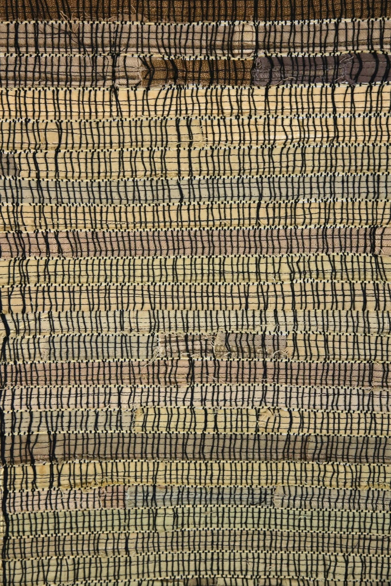 Fabric Panel, black cotton thread, khaki pant hem, 51 x 12, 2023