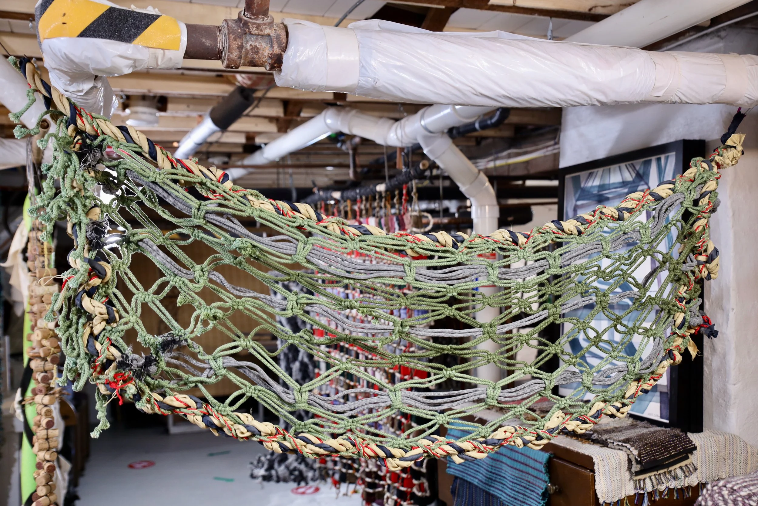Small Hammock, 2019, 48 x 18 x 1. Grey and Green Cords with Colorful Polyester Rope Border.
