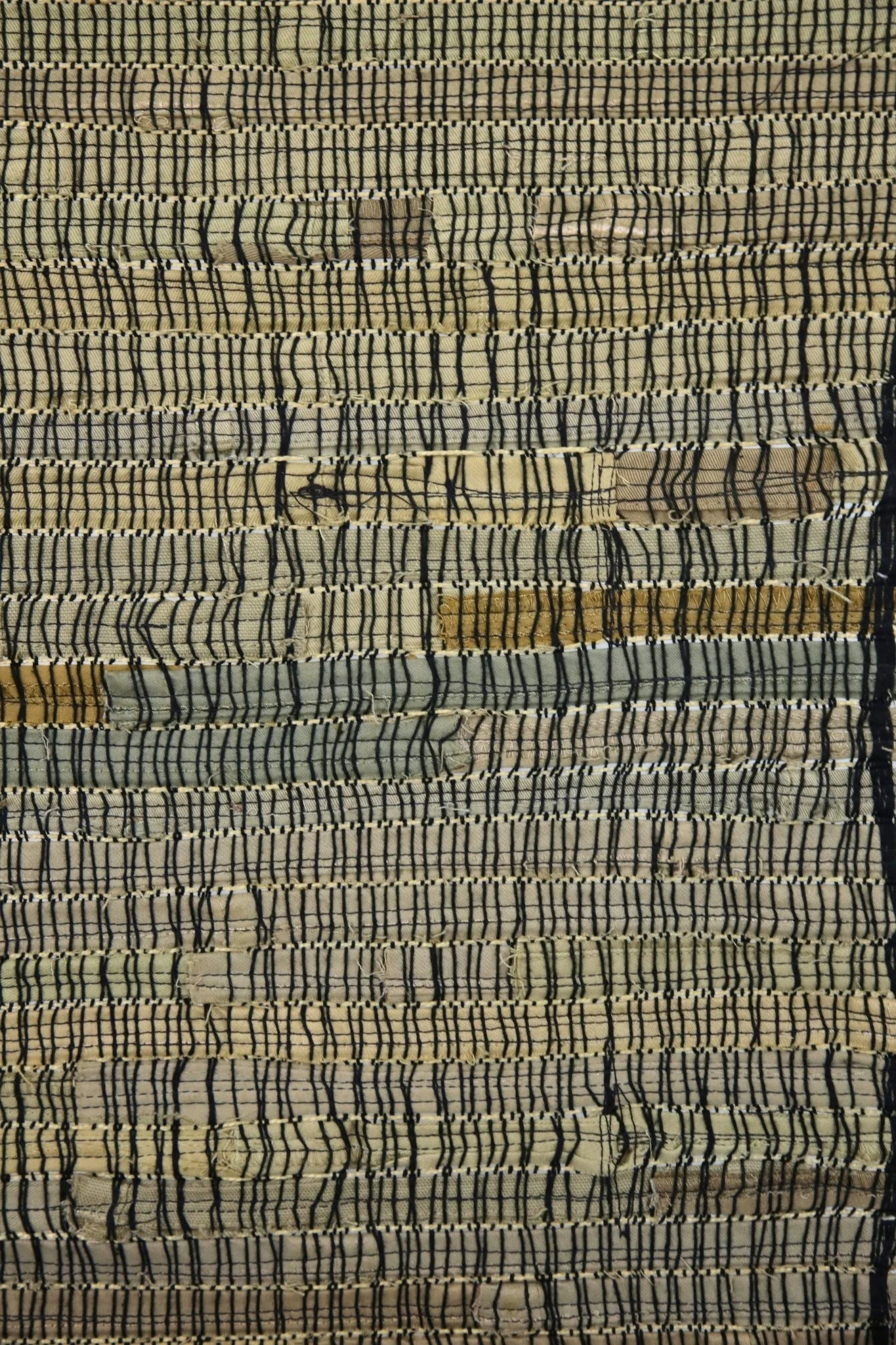 Fabric Panel, black cotton thread, khaki pant hem, 51 x 12, 2023