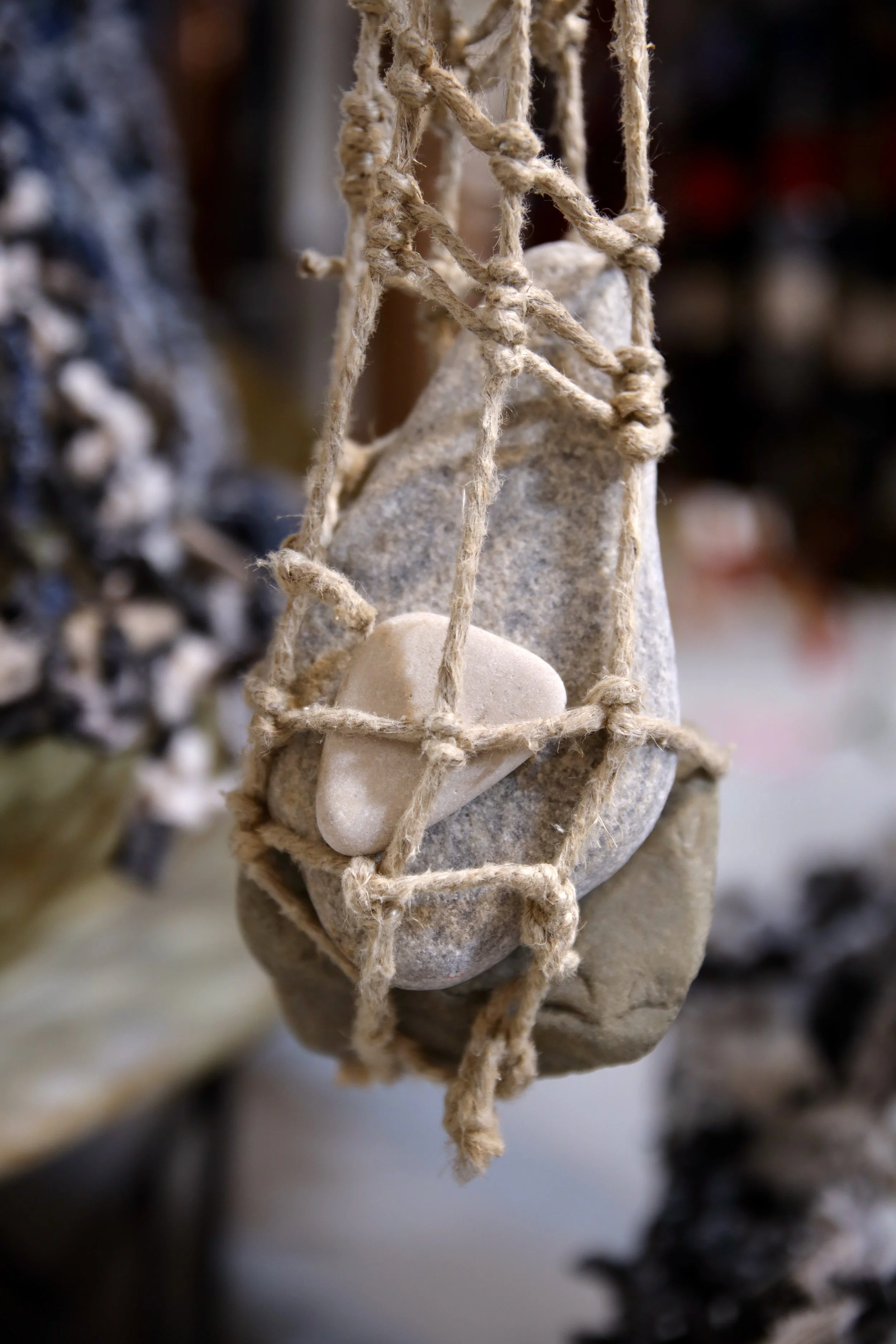 Cylindrical Net, 2017, 36. x 8, Jute String with Various Knots and Rocks.