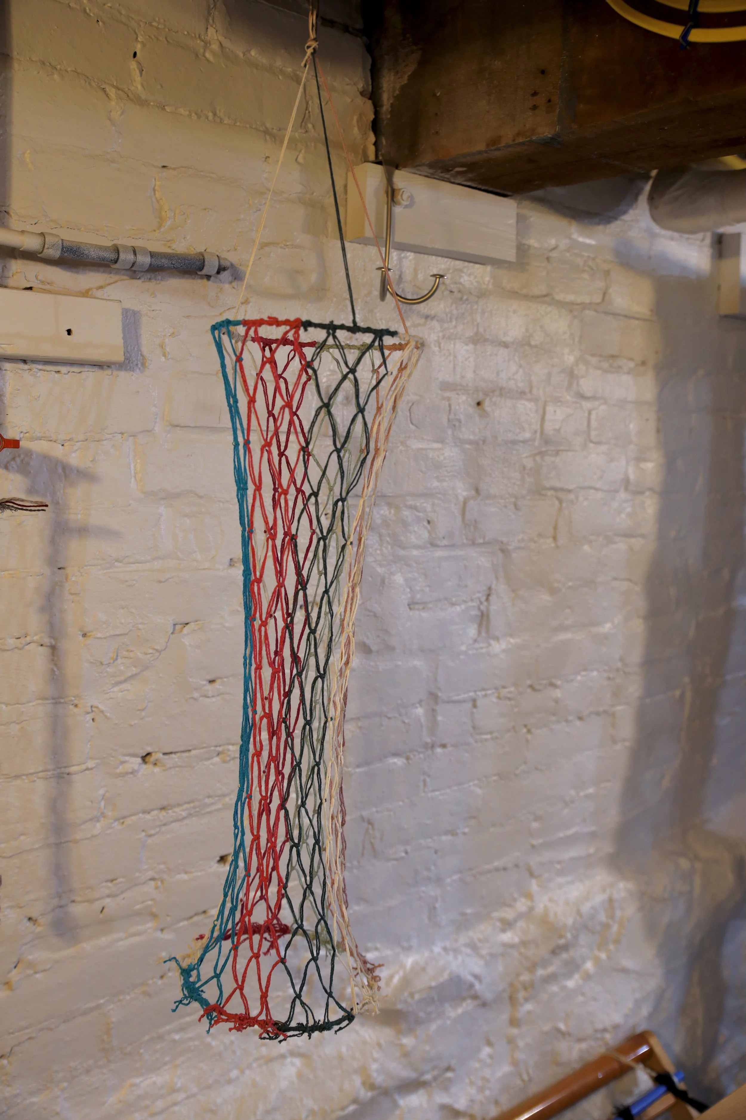 Cylindrical Net, 2019, 36 x 8 x 8. Made with Hemp Cord.