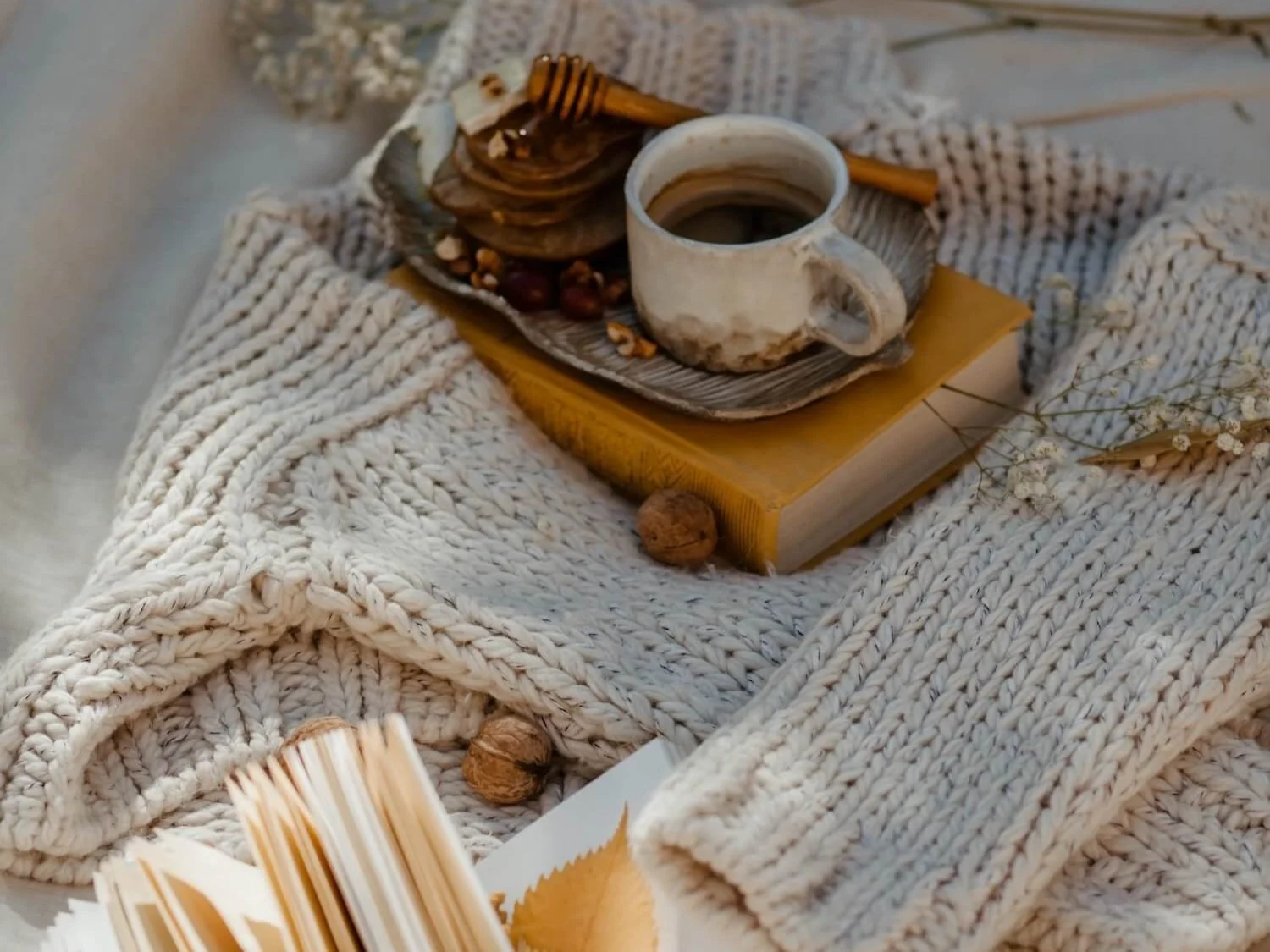 Coffee on a cosy jumper