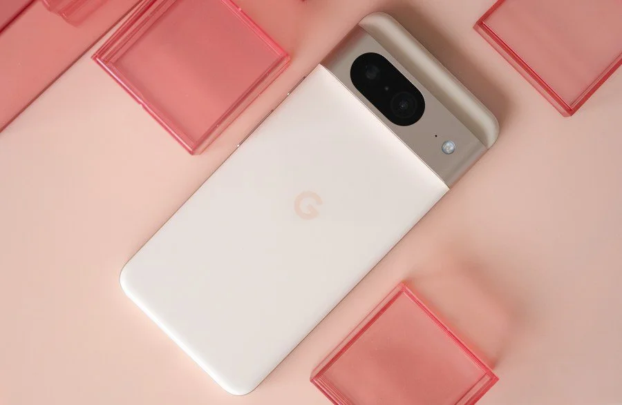 Pink Google Pixel 8 on translucent pink blocks, photographed by Allison Johnson / The Verge