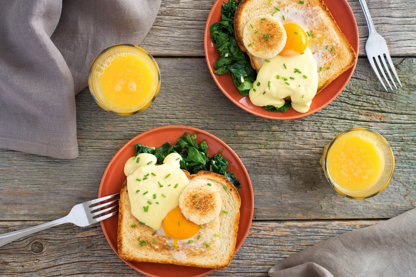 Egg-in-a-Hole with Wilted Spinach and Lemon Hollandaise Sauce