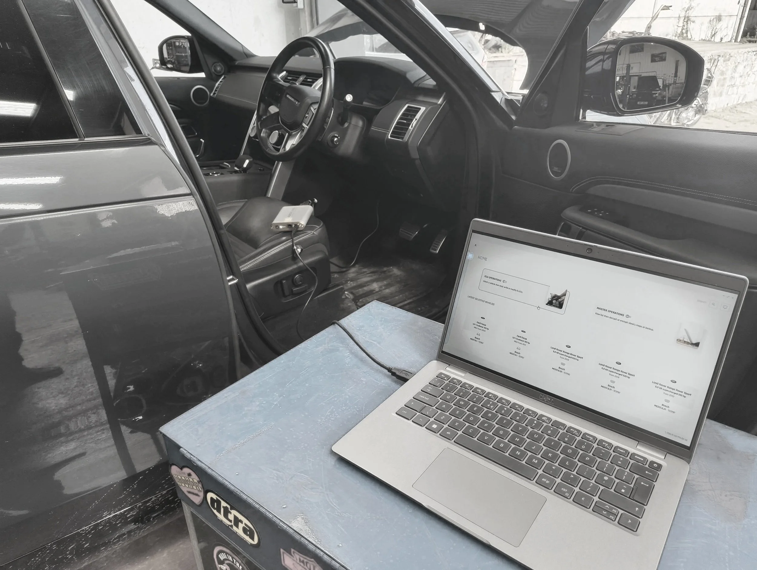 ECU programming equipment and laptop connected to a vehicle at Modurstang