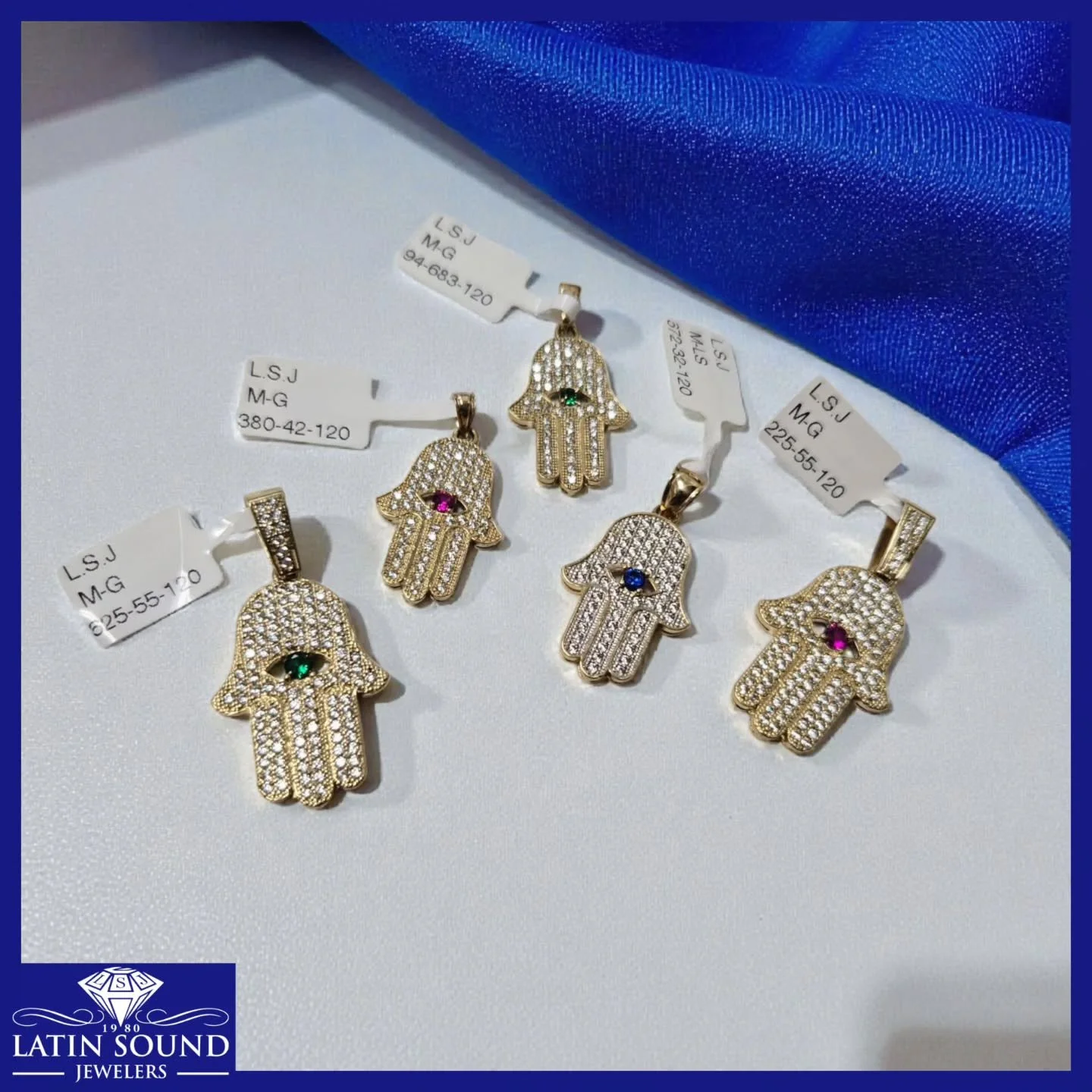 Charms of the Hand of Fatima (also known as the Hamsa) are worn for protection, good luck, and positive energy. At Latin Sound Jewelers, we carry them in 10K and 14K gold, beautifully set with CZs and available in several center-stone colors. Stop by