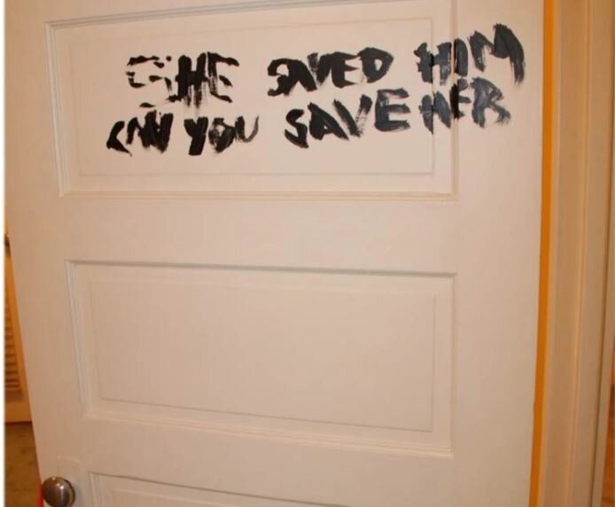 Message painted on bedroom door