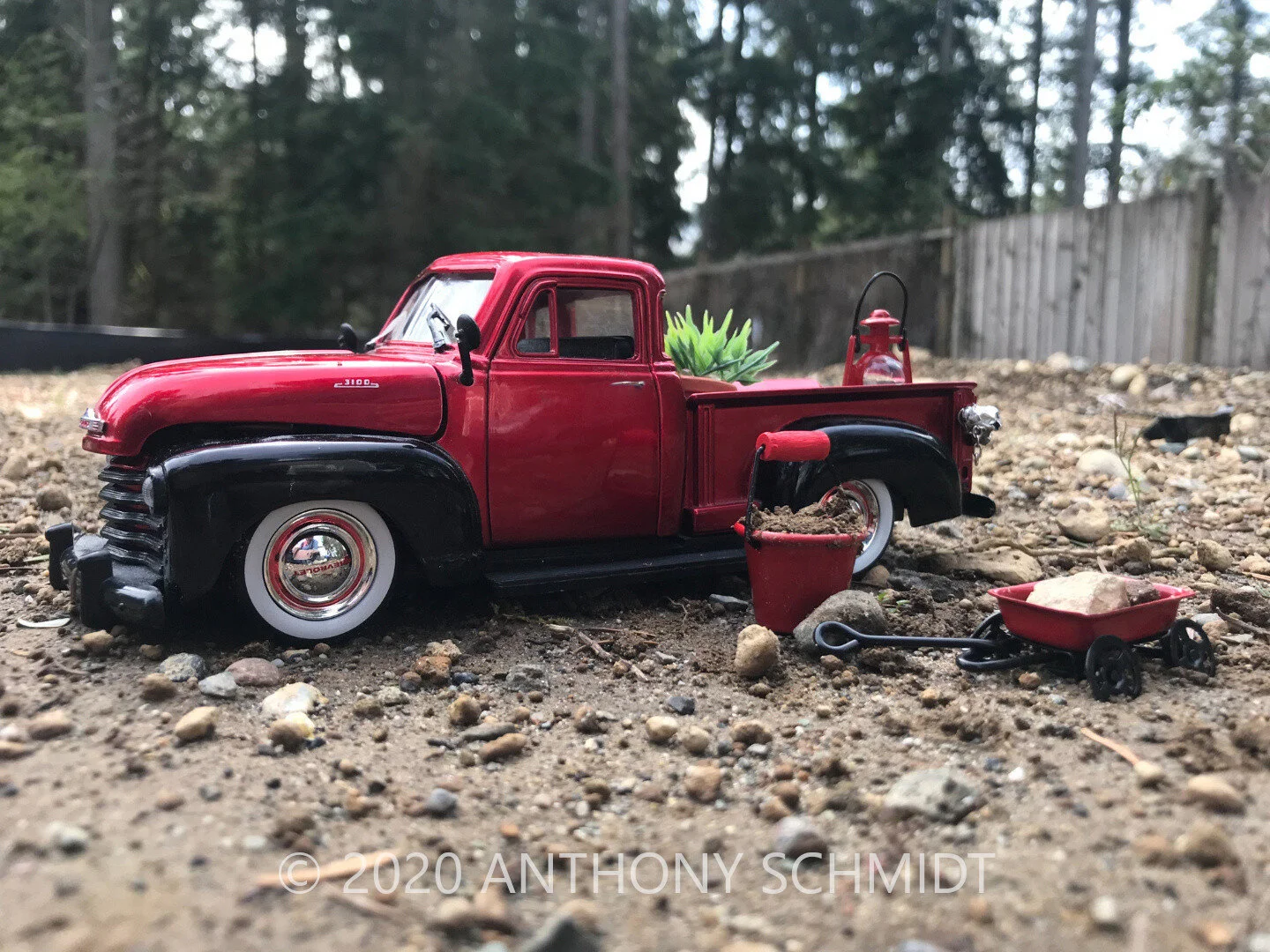 red truck with bucket.jpg