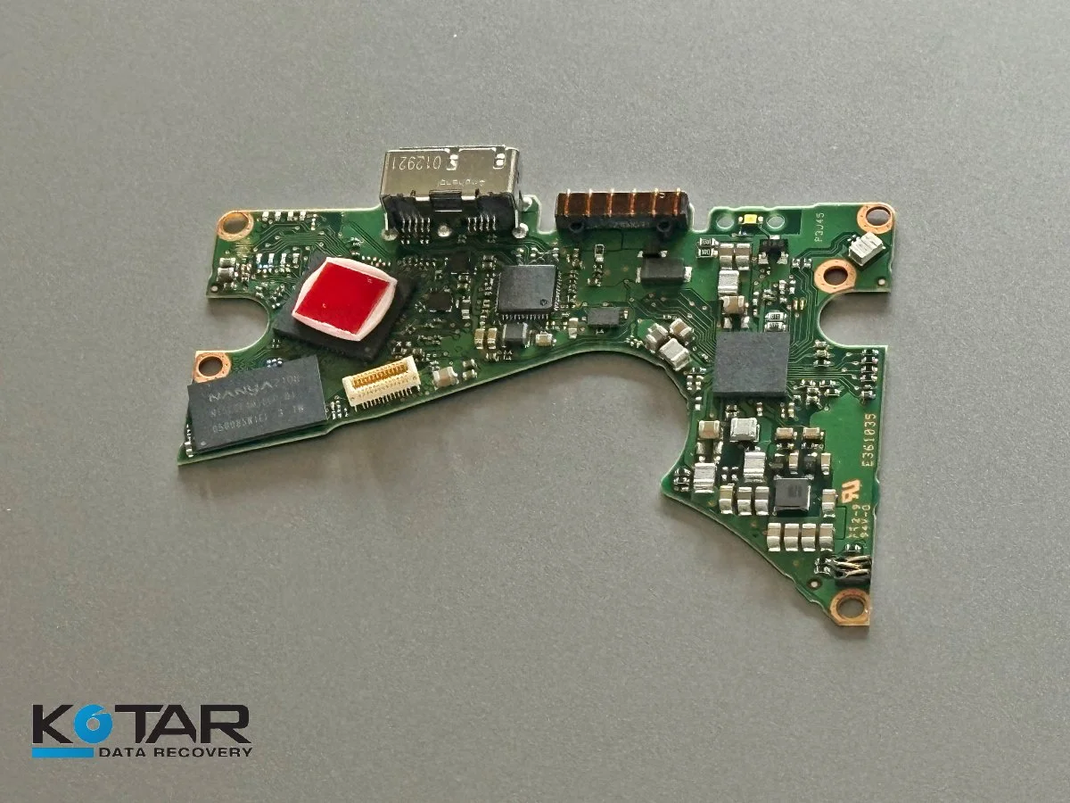 Damaged hard drive printed circuit board (PCB) used in advanced data recovery process at Kotar Data Recovery