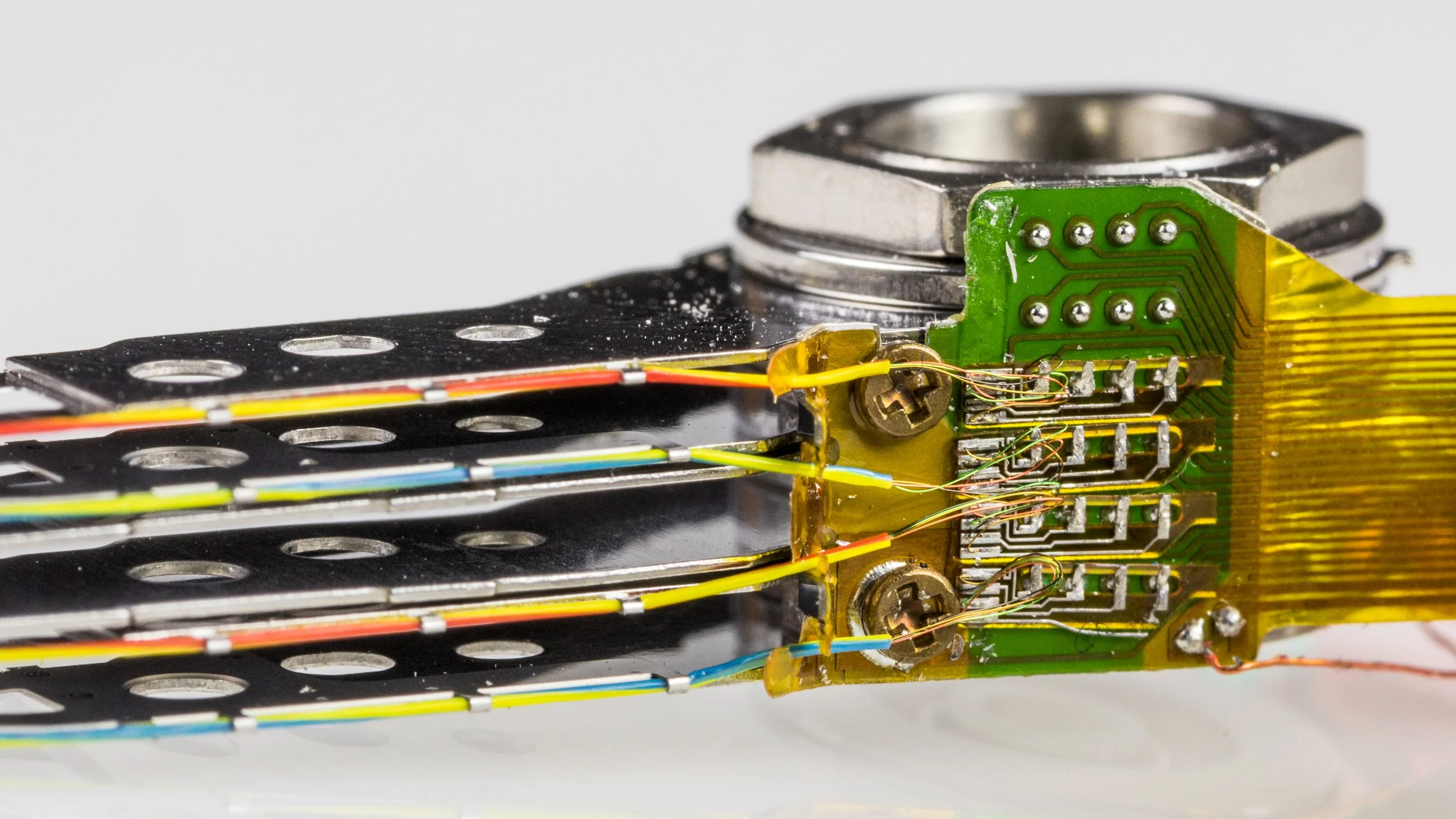 Close-up of hard drive internal components representing professional data recovery services in a specialized lab environment.
