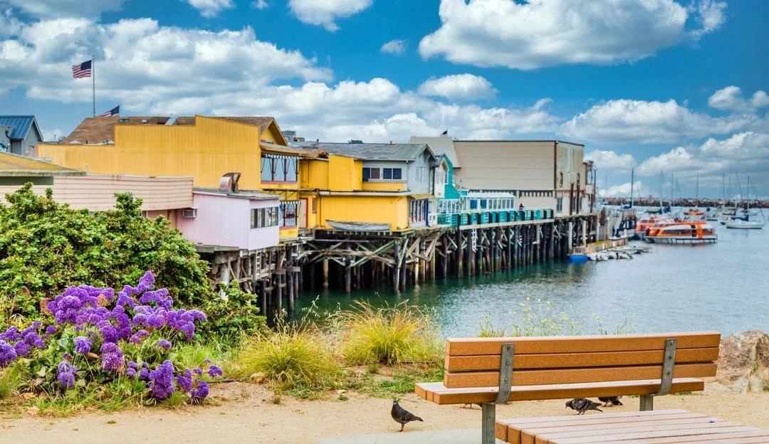 Historic Monterey waterfront buildings and marina along Monterey Bay in Monterey, California