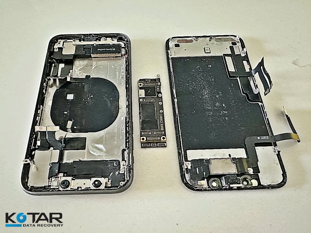 Opened iPhone with internal components exposed during iPhone data recovery inspection by Kotar Data Recovery