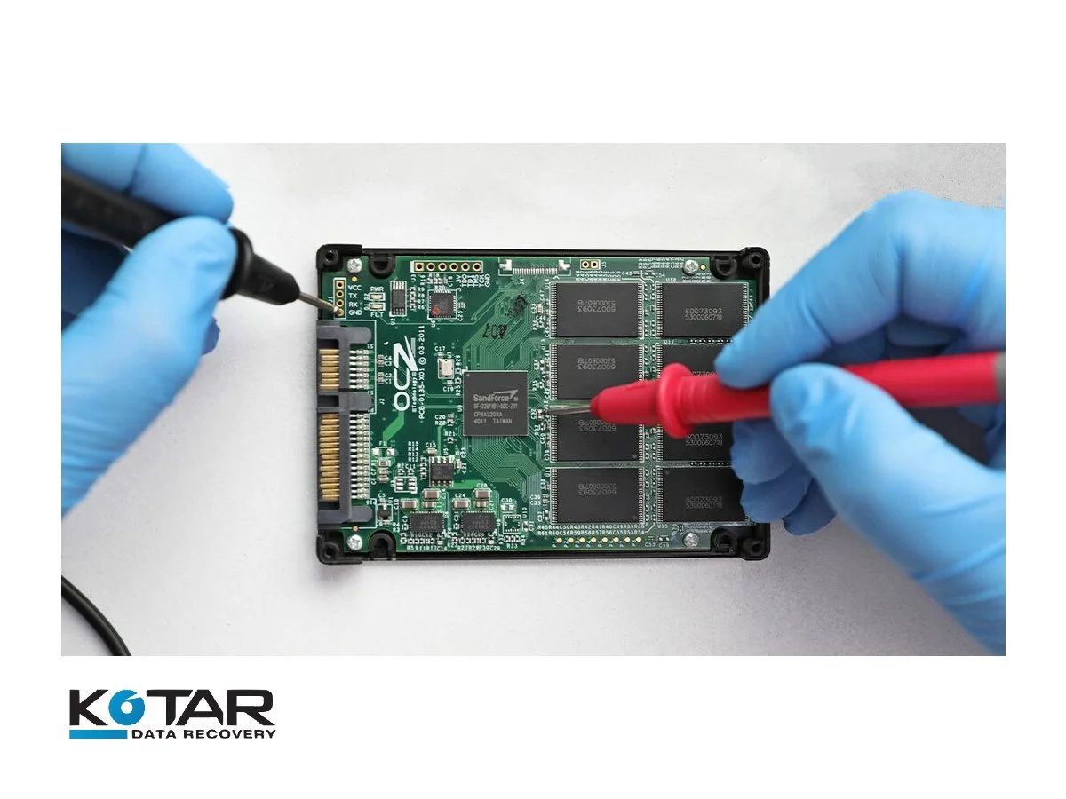 Technician performing on-site SSD data recovery with precision tools at Kotar Data Recovery lab.