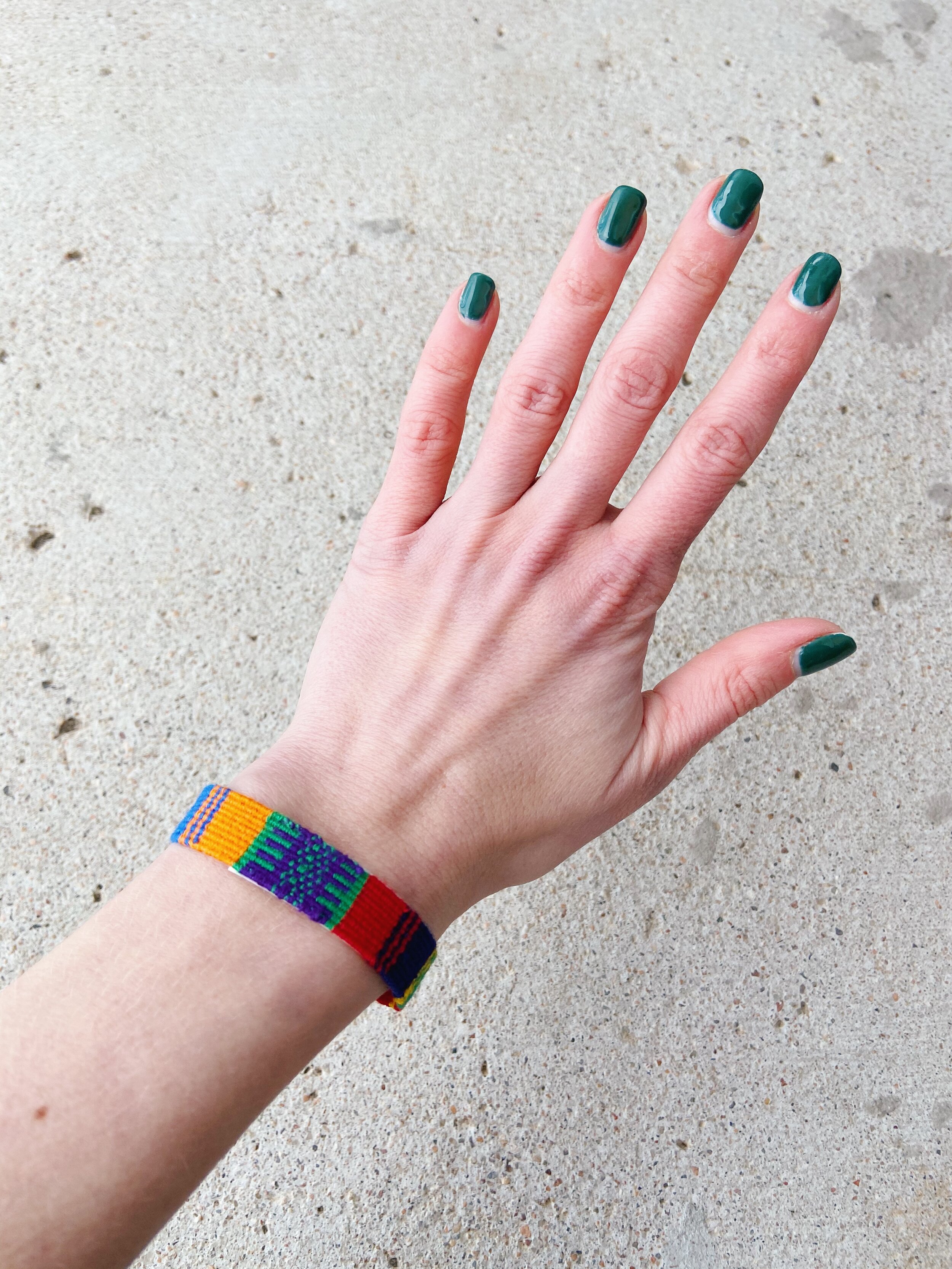 Rainbow Cinta Friendship Bracelet, Mayan Hands, worn on a wrist