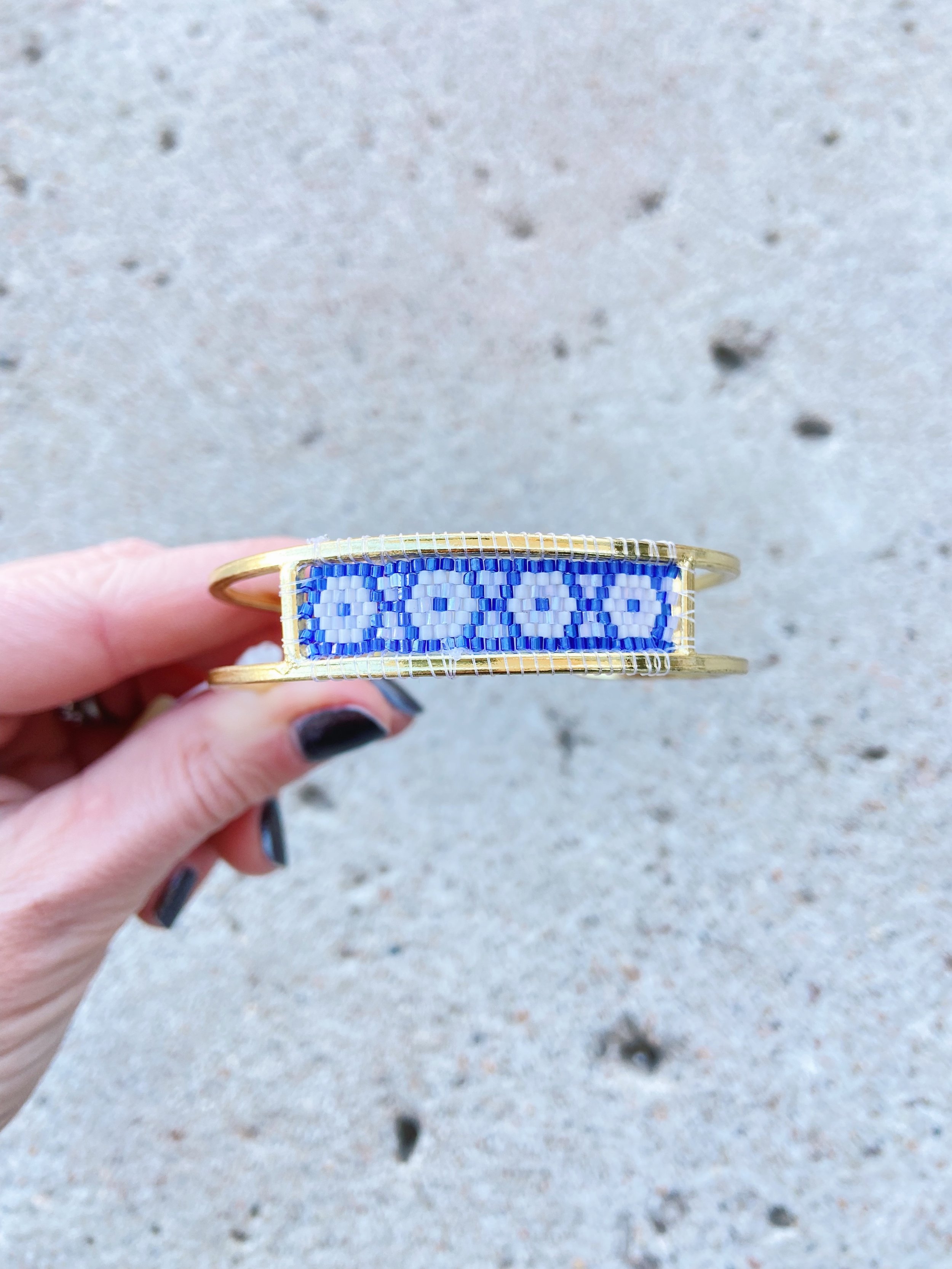 Allegory Bracelet, Mata Traders, held facing forward