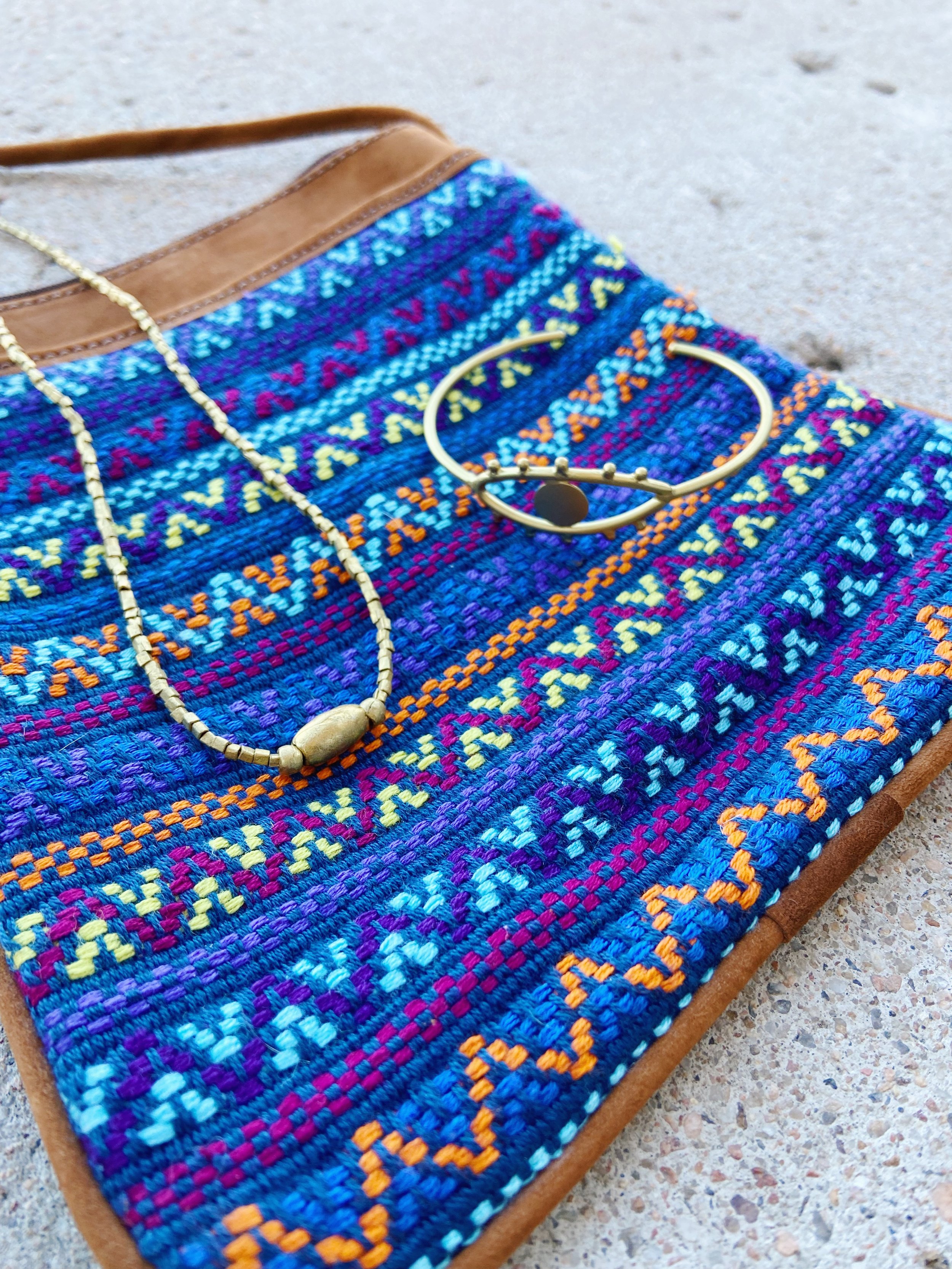 Eye to Eye Bangle, Emnet Gold Necklace, Navy Santiago Brocade Leather Pouch