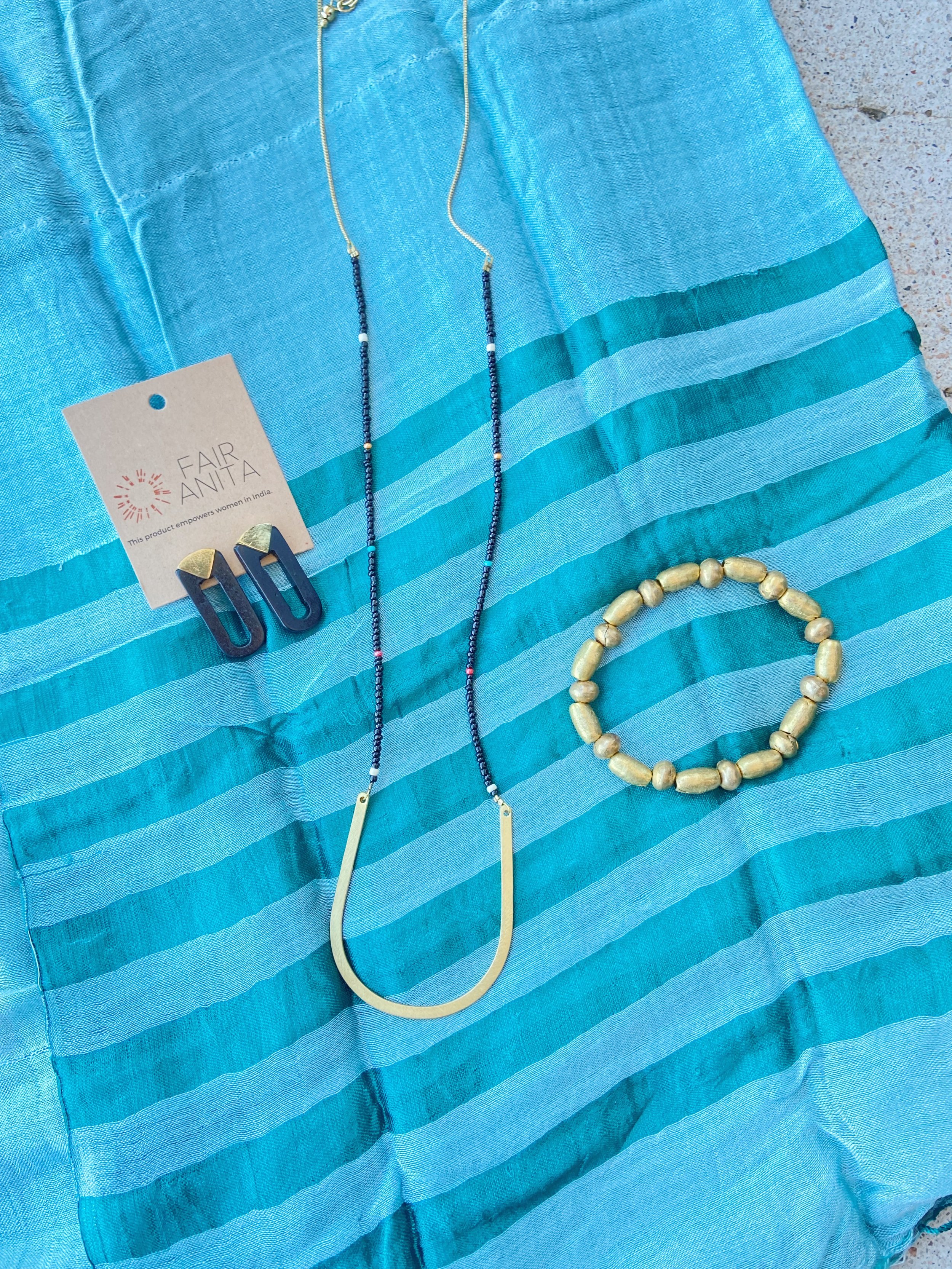Carolina Necklace, Justice Horn Earrings, Gold Shell Bracelet, Teal Binh Scarf