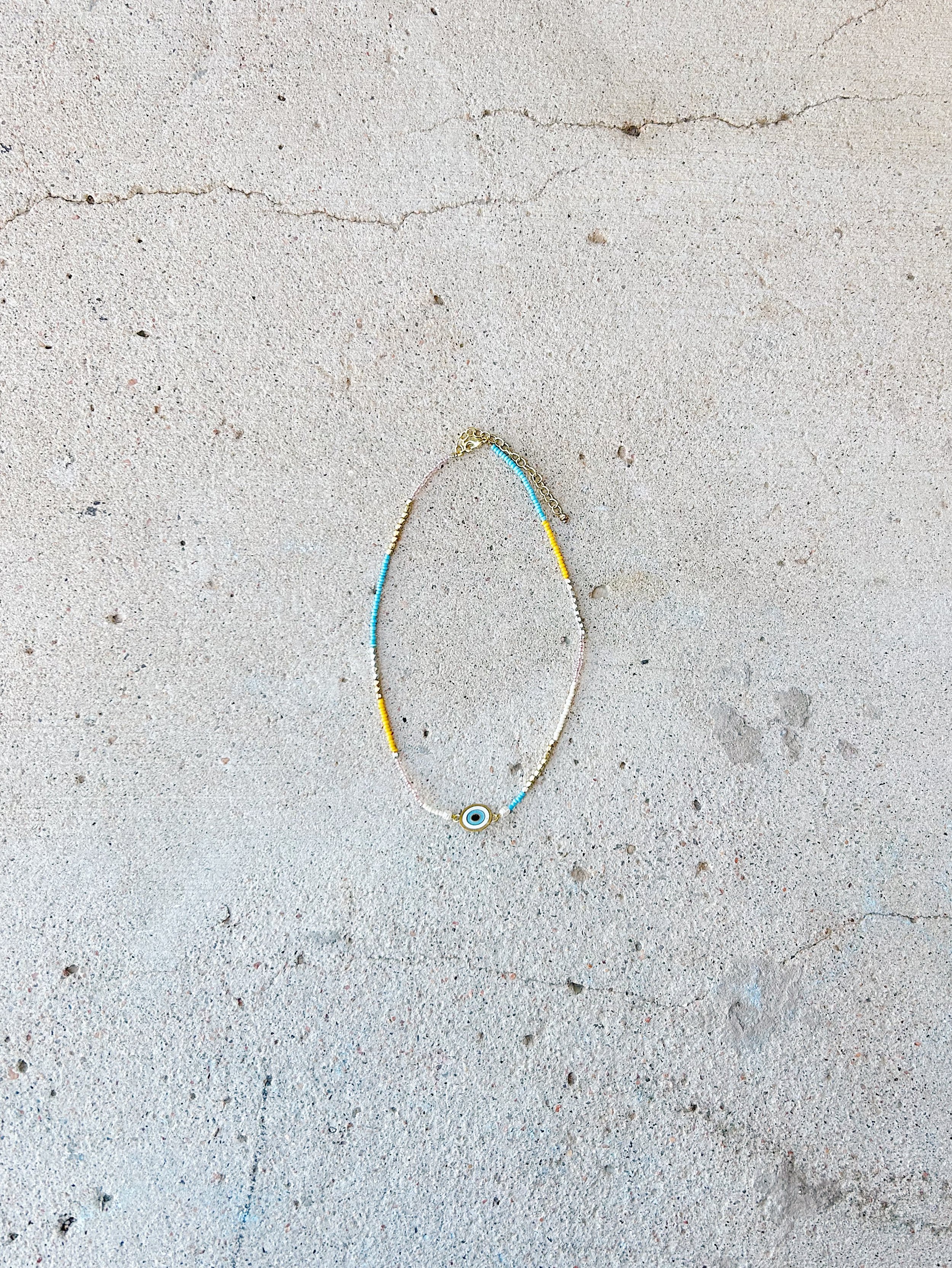 The Double Vision Necklace is shown at a distance so the full necklace can easily be seen.