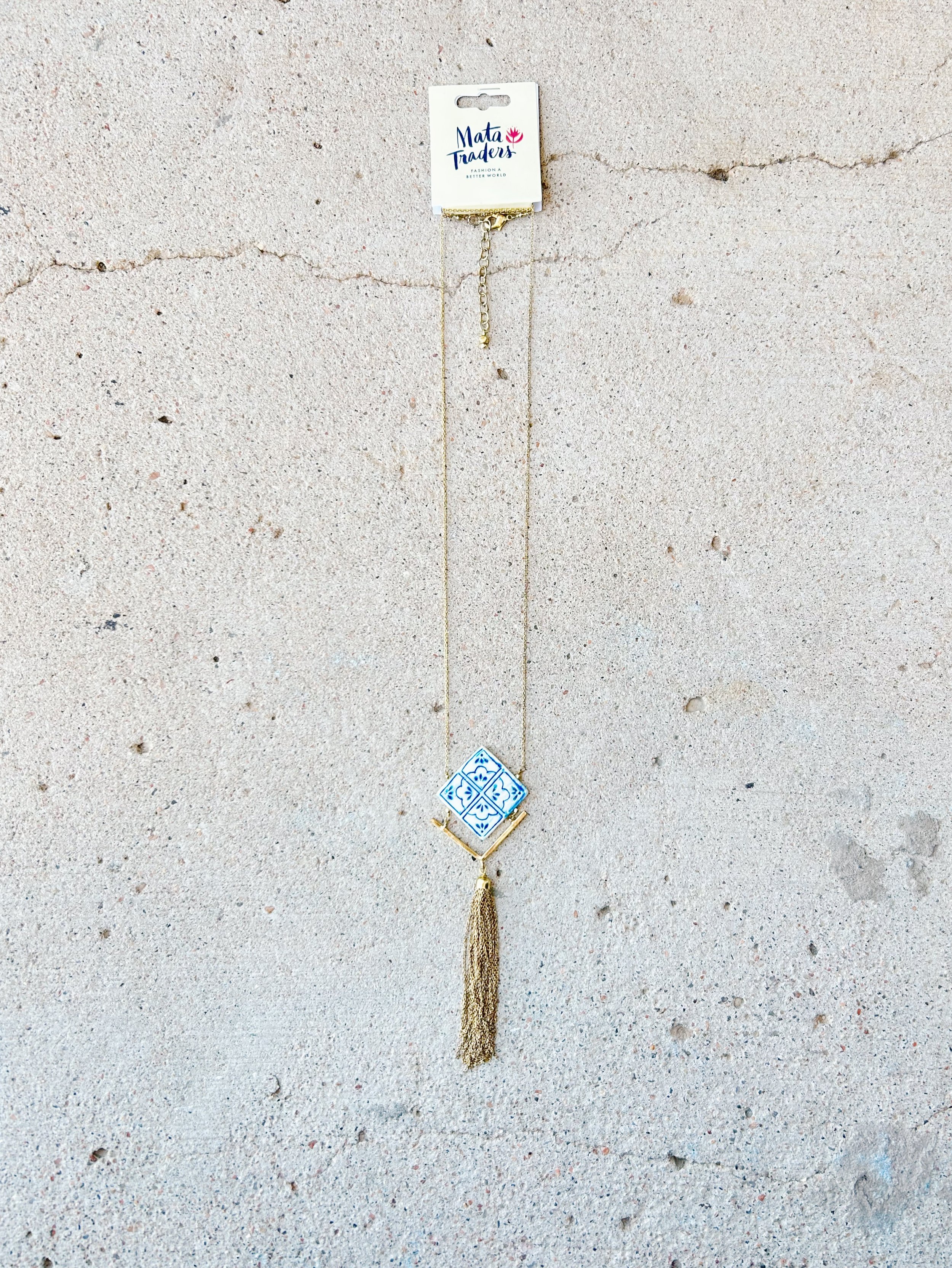 The Mallorca Tile Necklace originally comes from Mata Traders and comes with Mata Traders packaging.