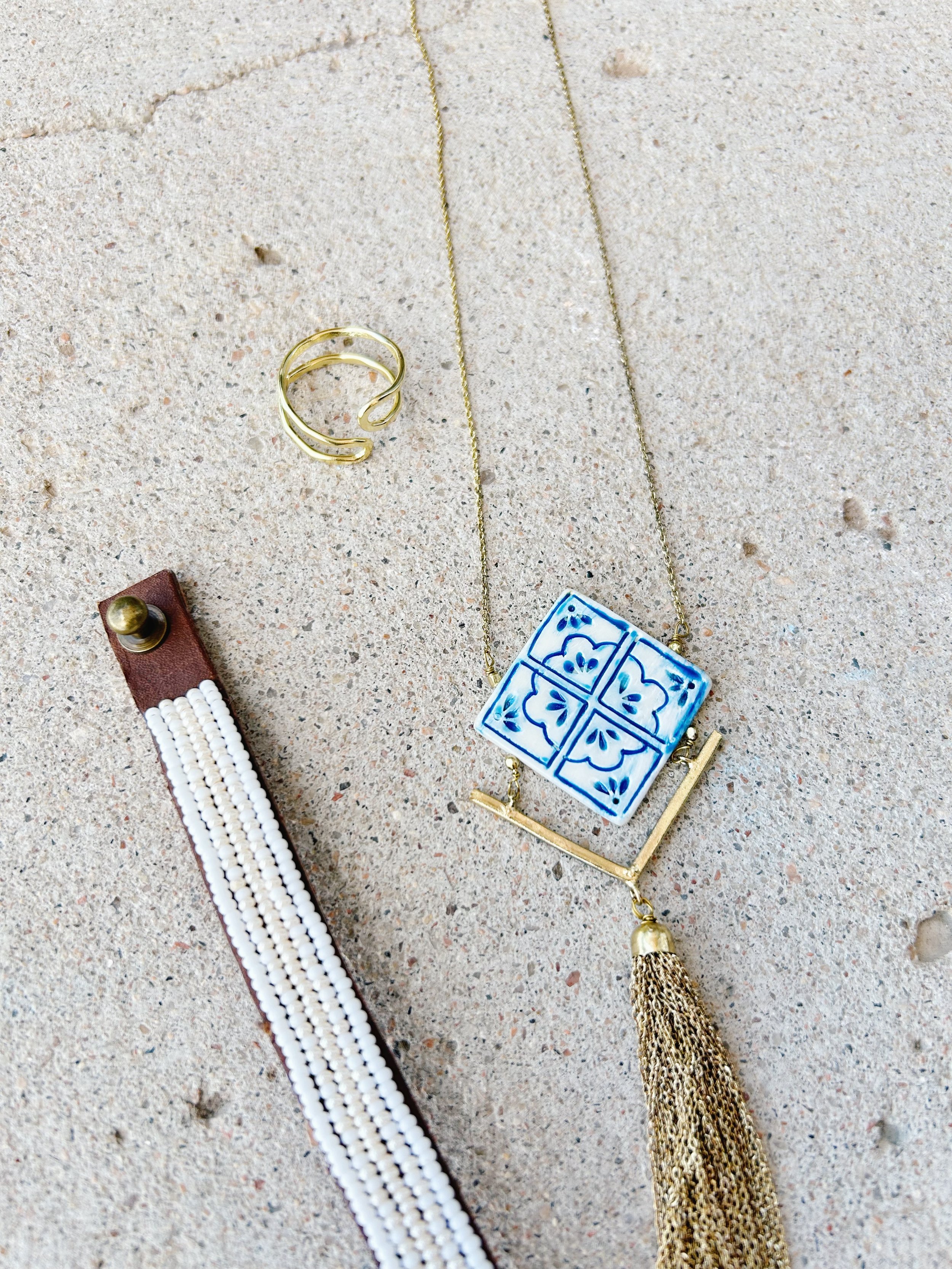 The Mallorca Tile Necklace pairs well with the Beaded Cuff Bracelets and Foster Beach Ring.