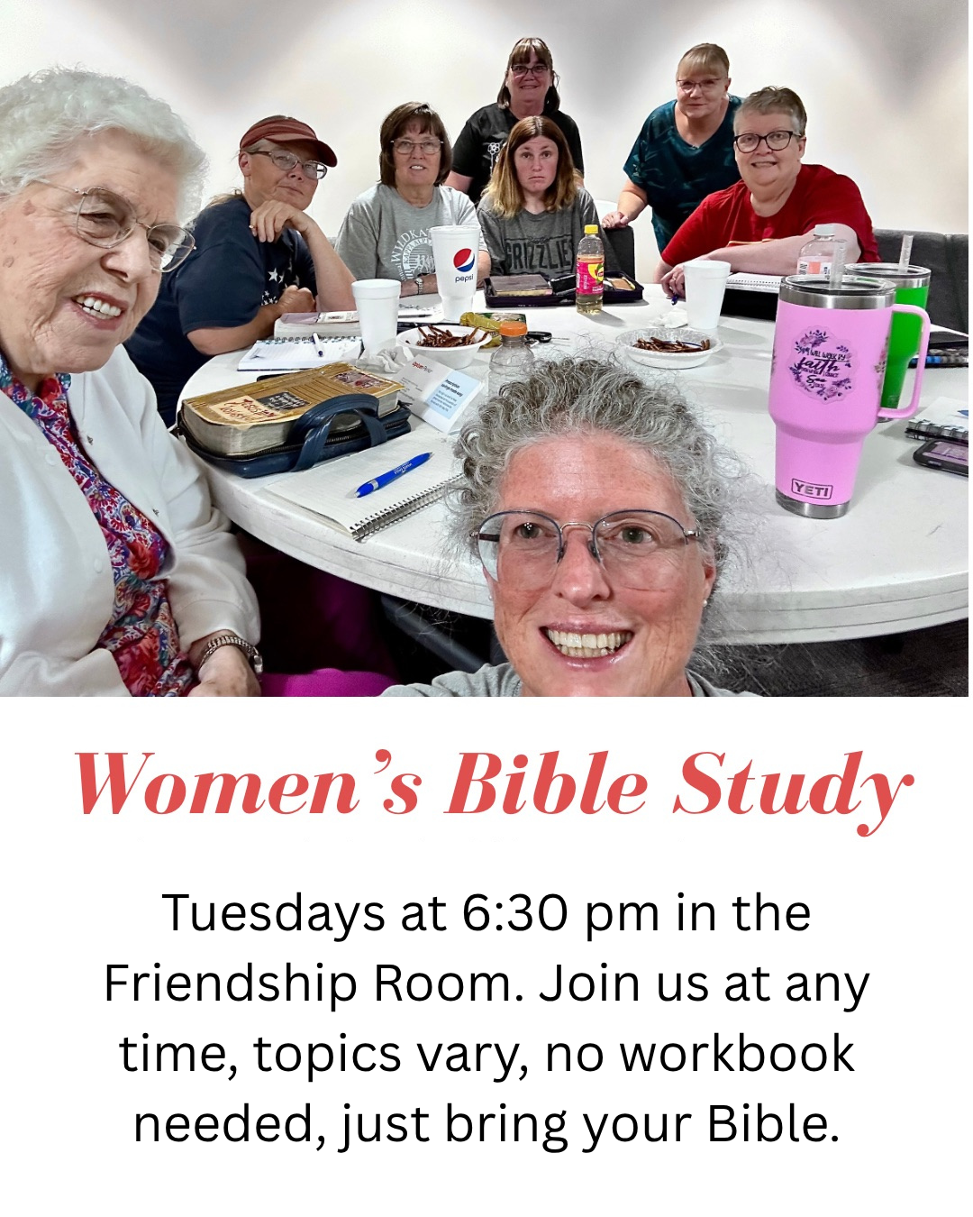 A group of women gathered around a table for a Women's Bible Study, with notes and snacks visible on the table.