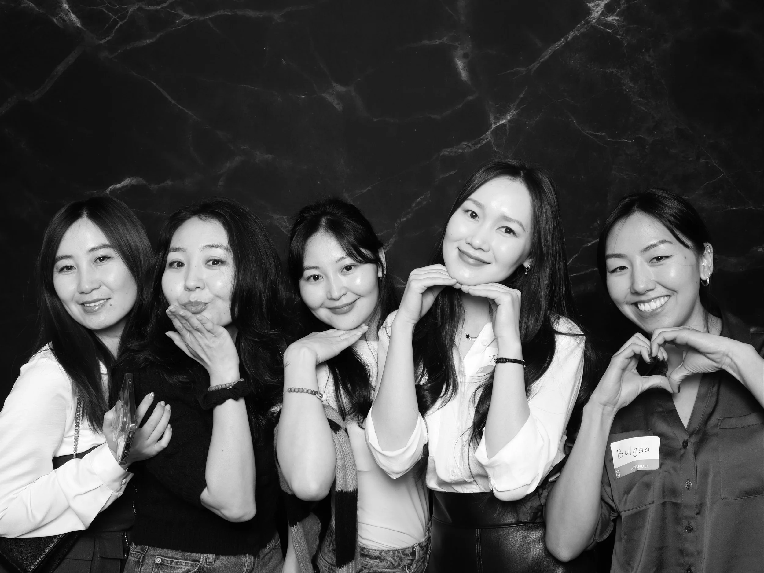 Guests enjoying a Bay Area photo booth at a corporate event