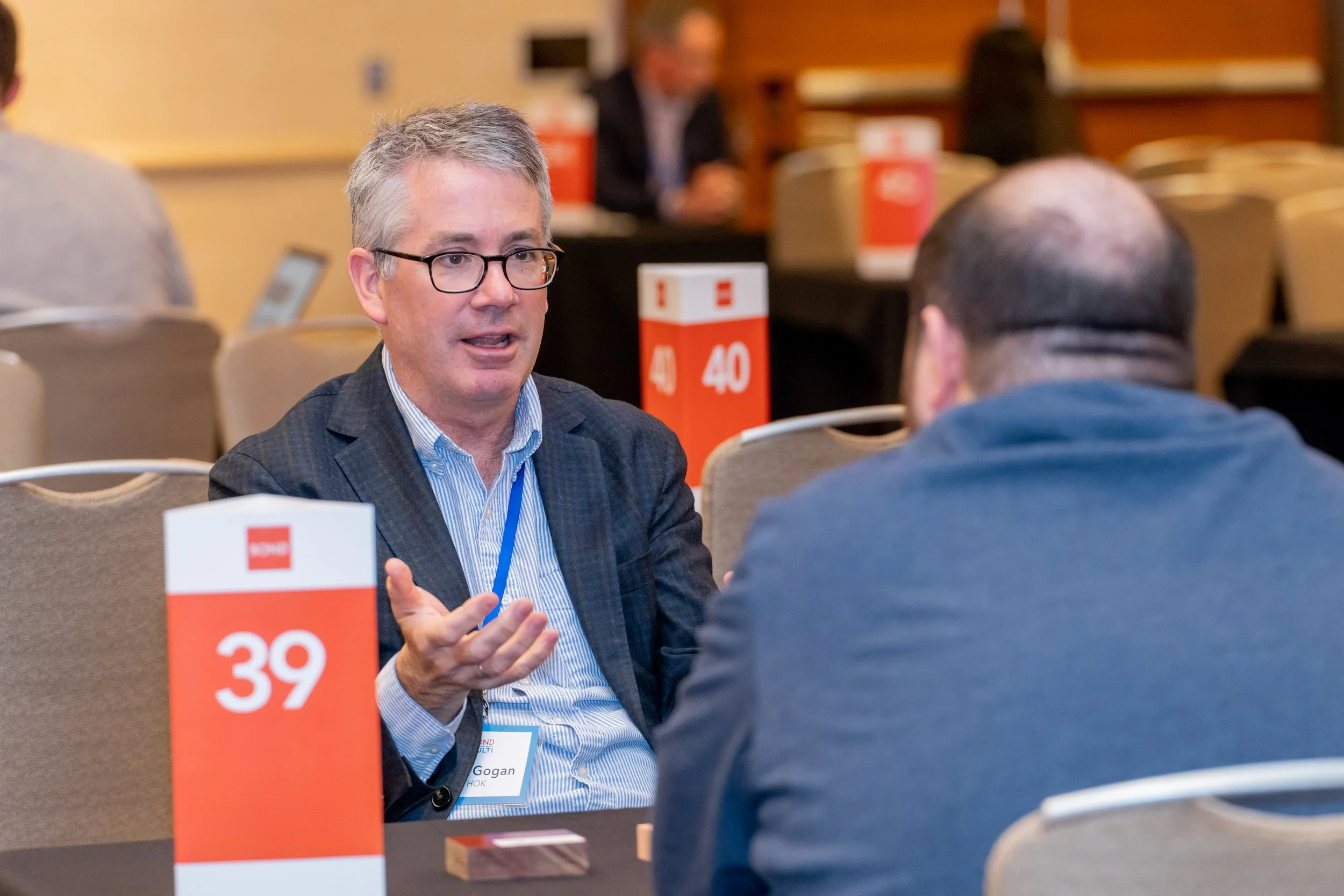 Professional corporate networking event photography at a business conference