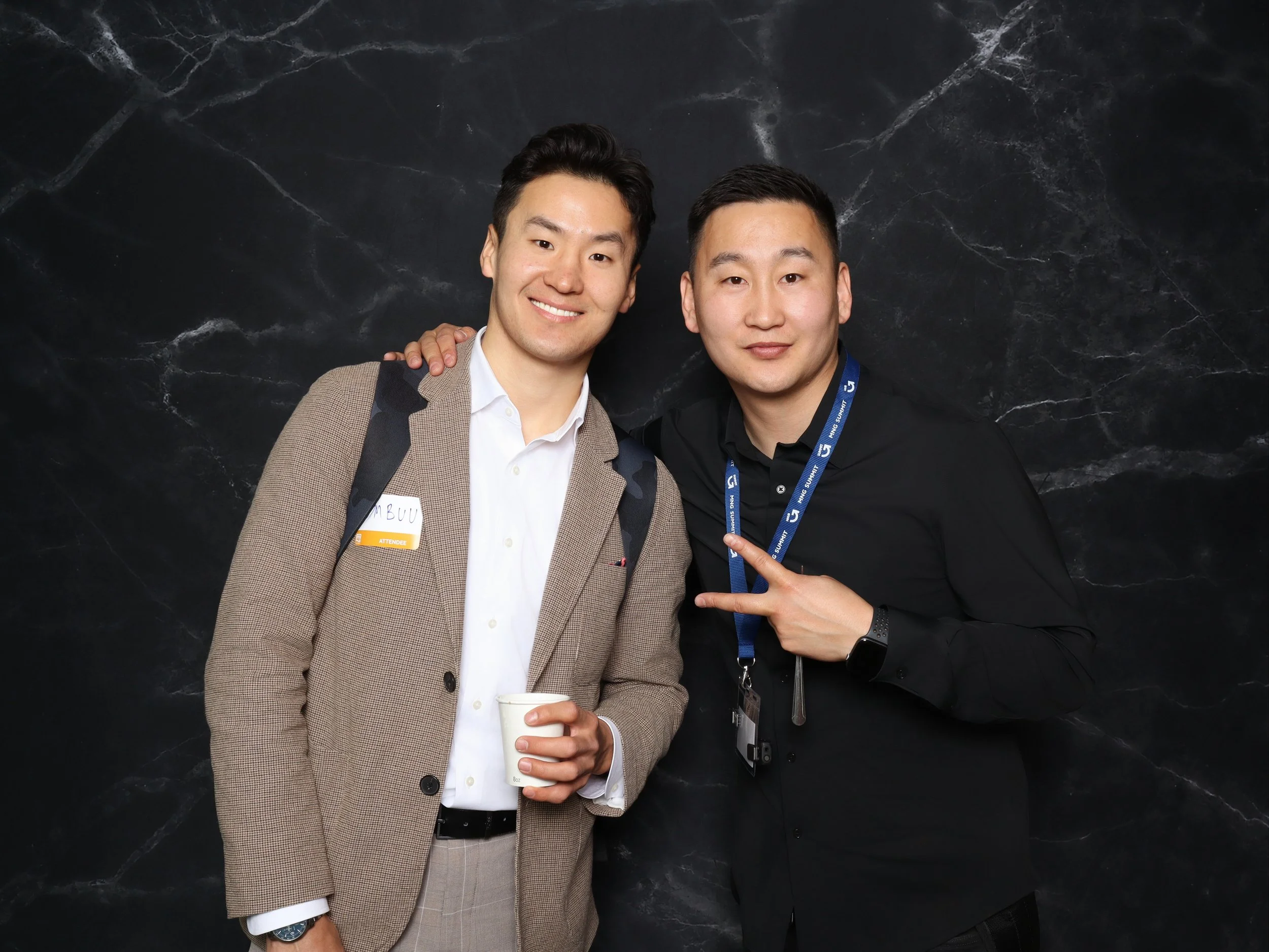 Professional photo booth picture of two networking event guests