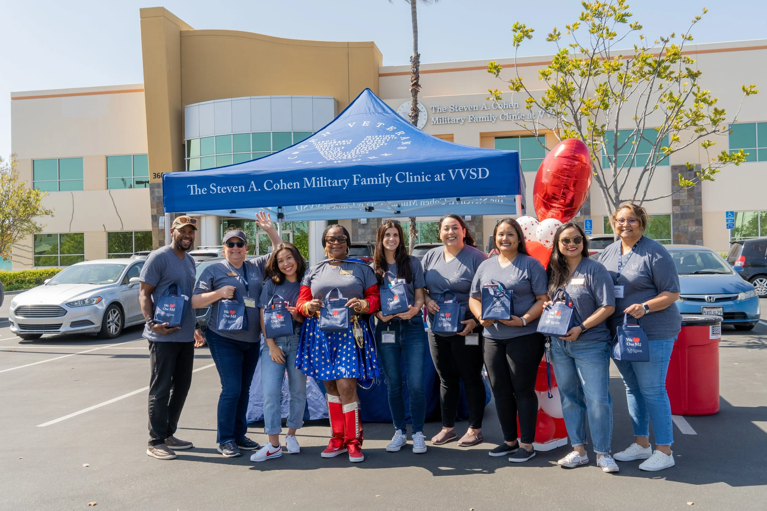 Event photography capturing a team at a community outreach event