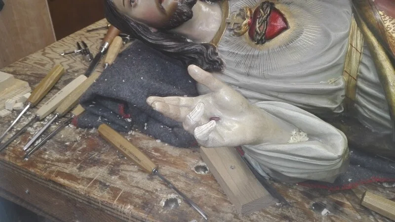 Replacement fingers carved in