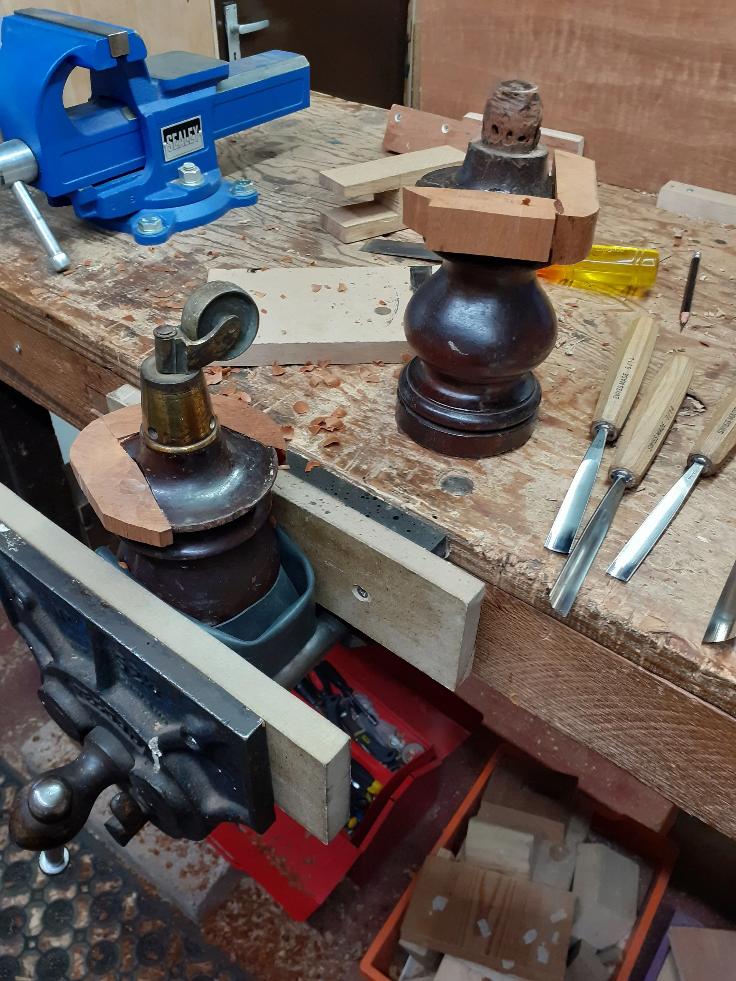Mahogany turned legs being prepared for some restoration