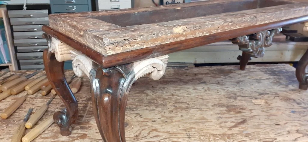 Replacement leg scrolls redesigned and carved in walnut
