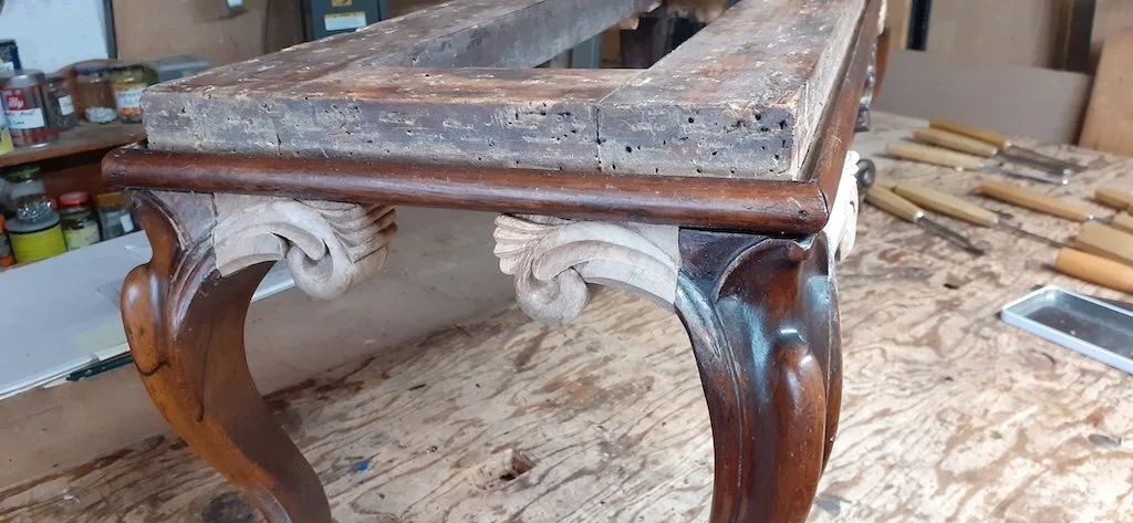 Replacement leg scrolls redesigned and carved in walnut