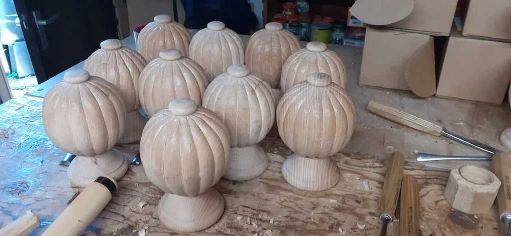 Finials in beech carved for curtain pole ends