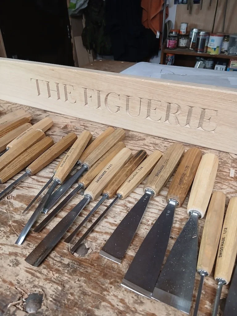45mm lettering carved into oak to cover a lintel over a cottage door