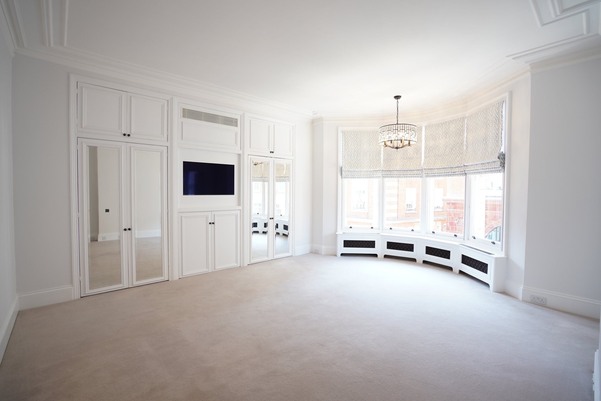 5. Sloane St - Master bedroom.jpeg
