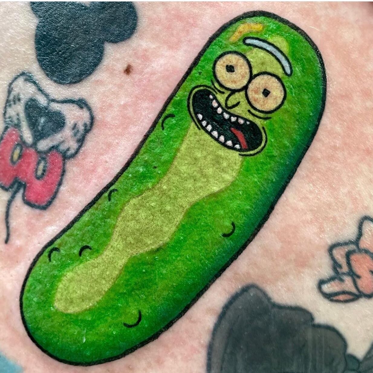 Pickle Rick! Done by @amyrose.tattoo contact her to book in! She&rsquo;s loving all things colourful and cartoony aswell as neo-Japanese. Feel free to talk to her about any ideas you may have. #tattoo #tattoos #ink #inked #tattooed #tattooedmen #tatt