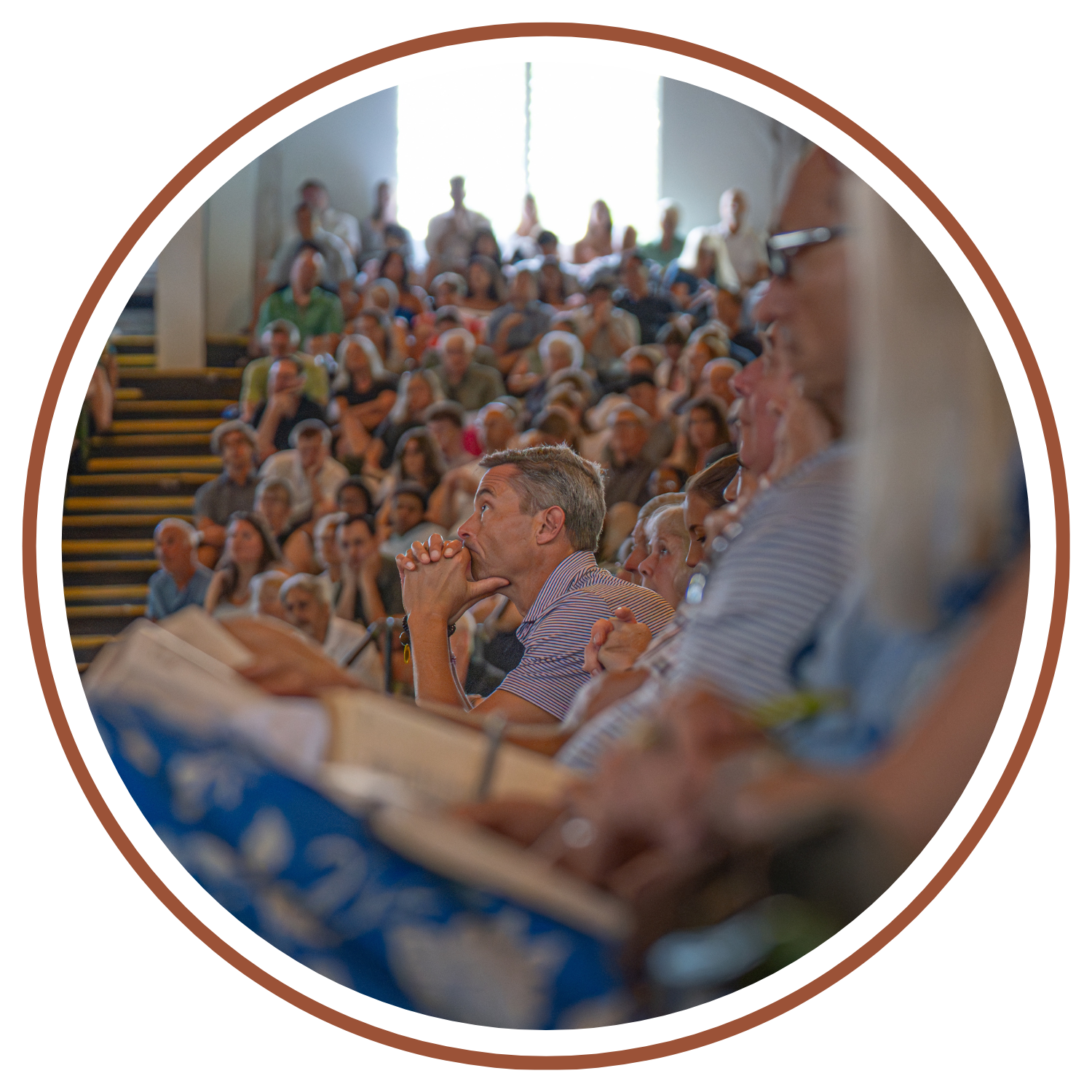 Man listening to Chapel Speaker at CAMP-of-the-WOODS