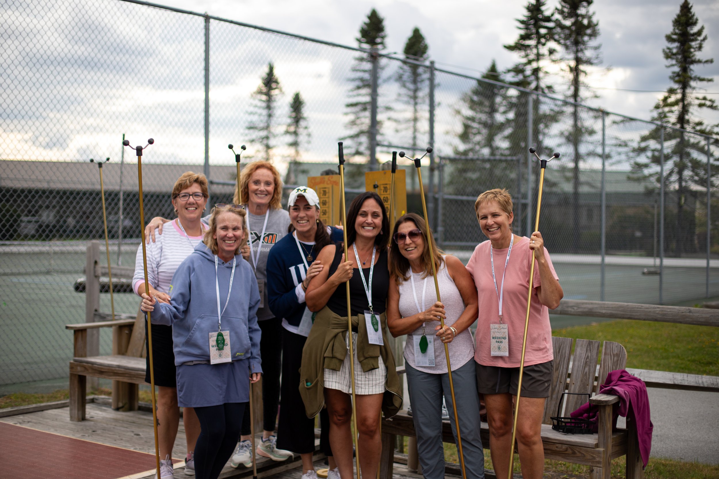 Women Smiling while playing shuffleboard