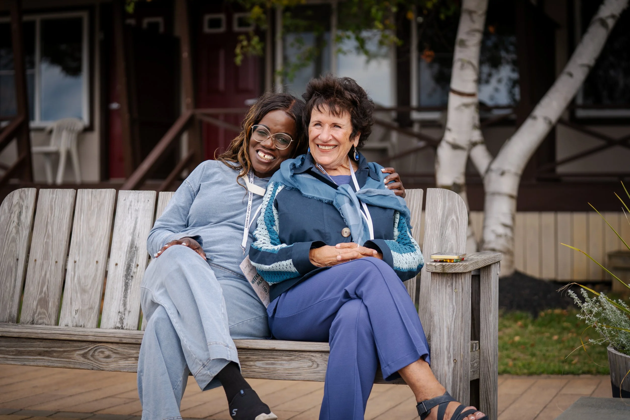 Women sitting together by the beach