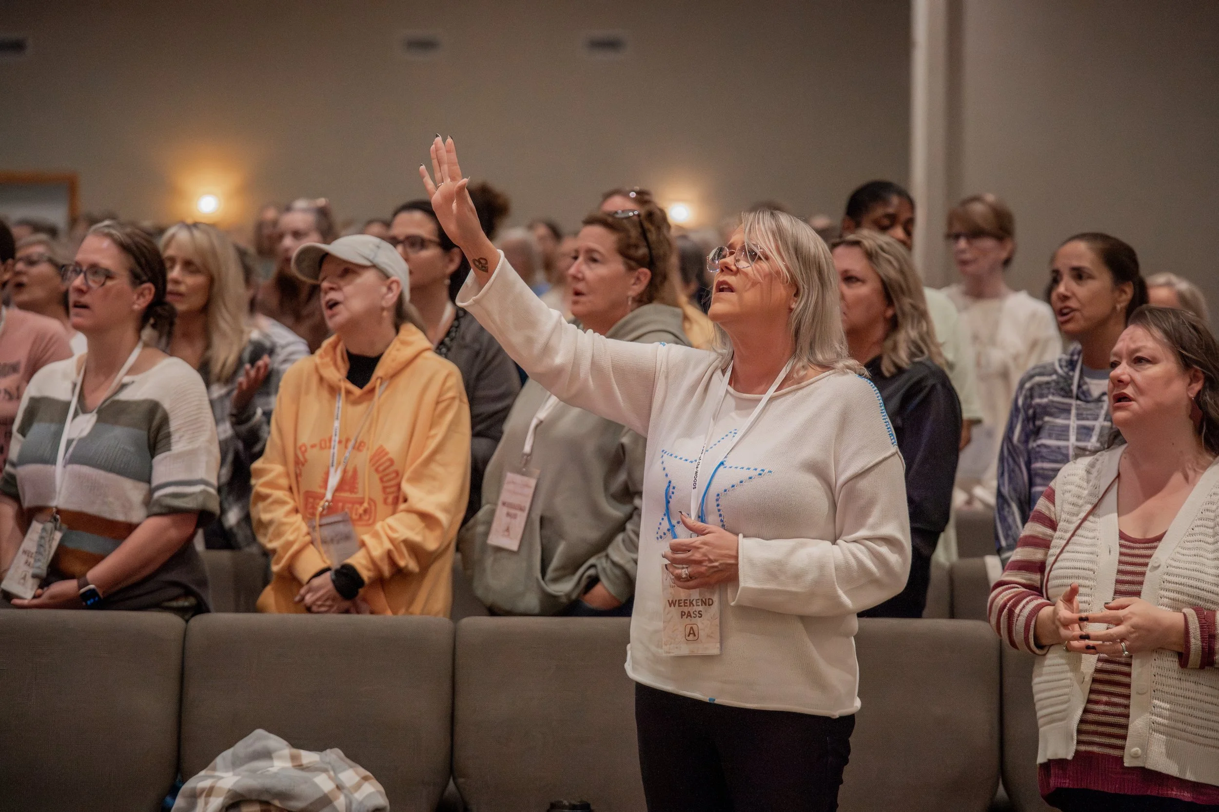 Women Worshipping at CAMP-of-the-WOODS Women's Conference