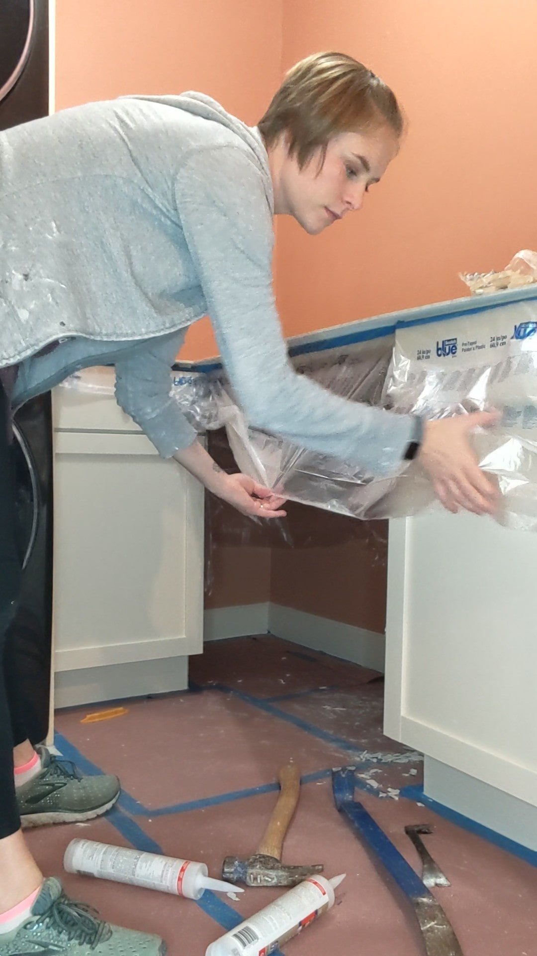 Protecting_Cabinets_with_Plastic.jpg