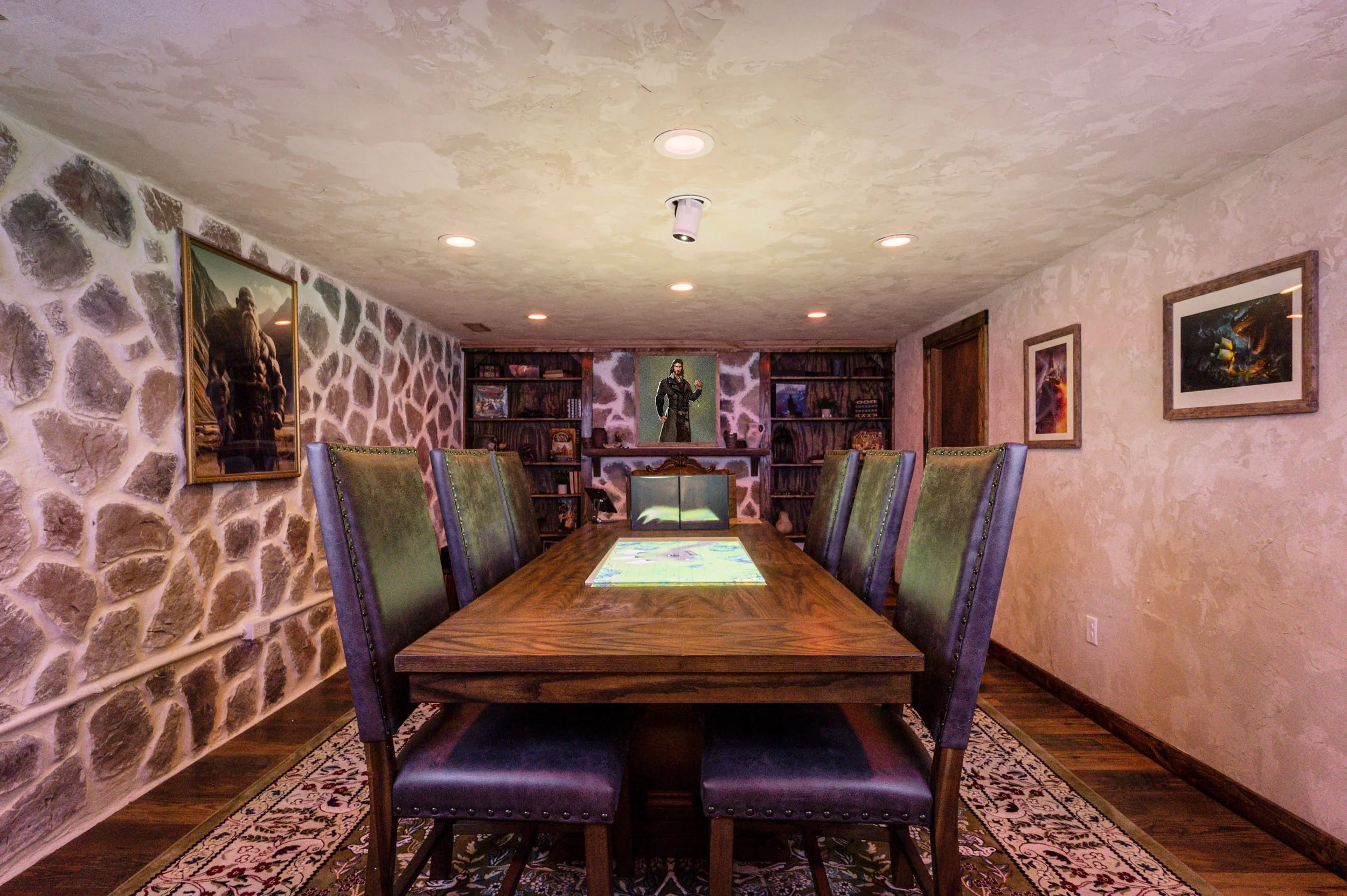 D&D game table with projected map and leather chairs