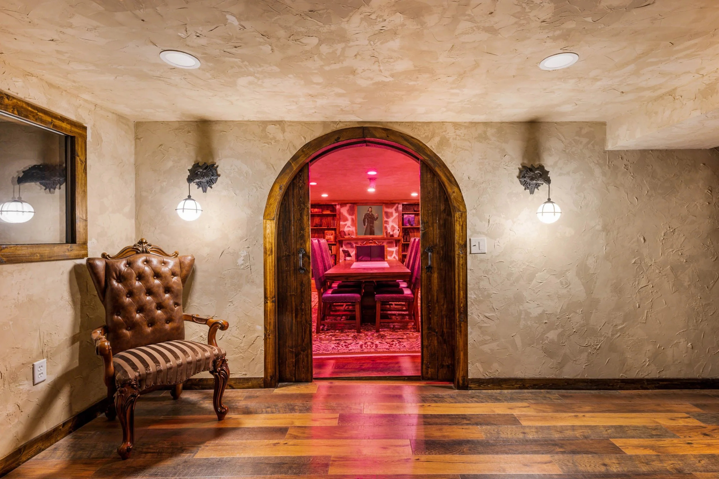 Arched doorway leading to immersive game room