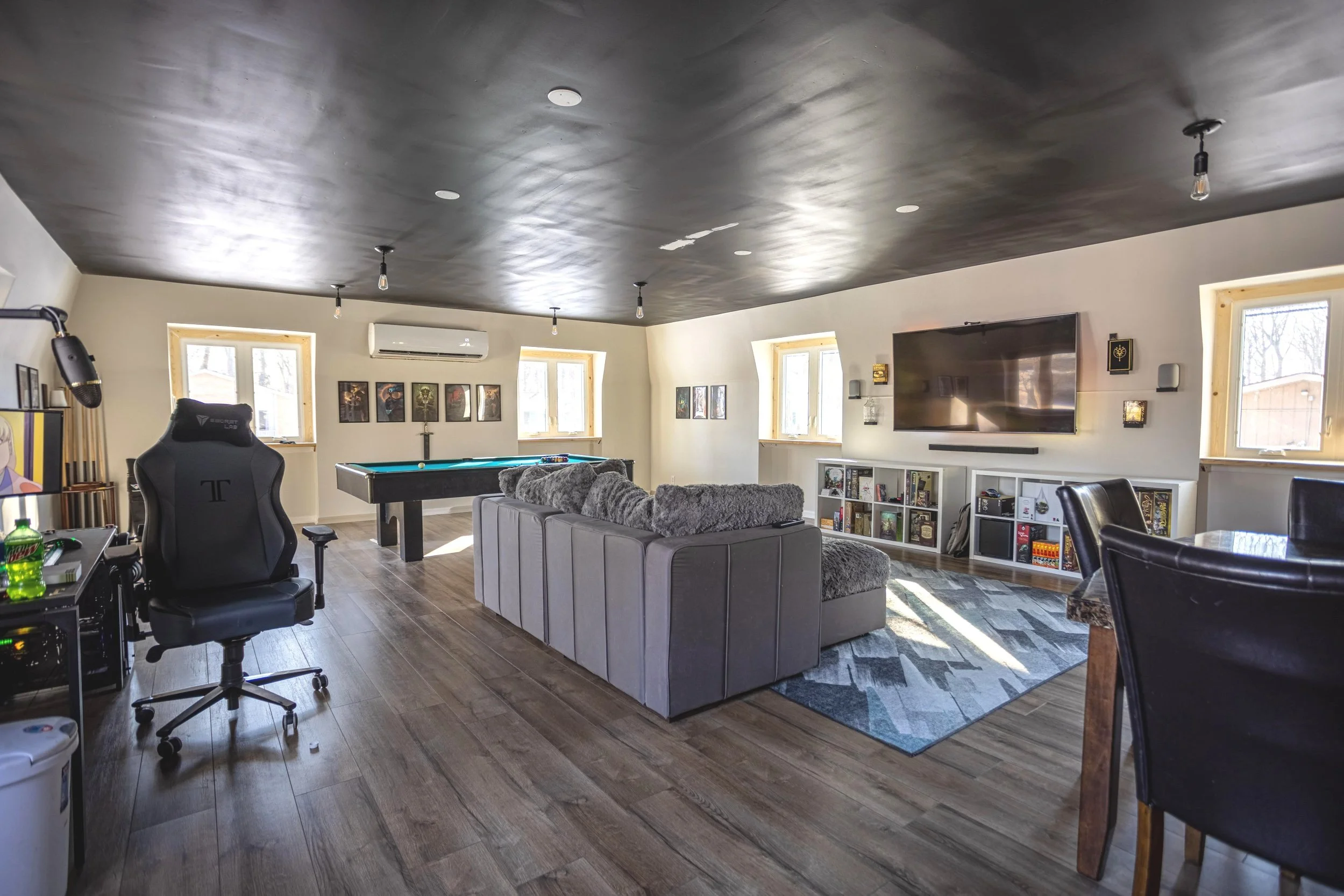 Rec room with couch and pool table