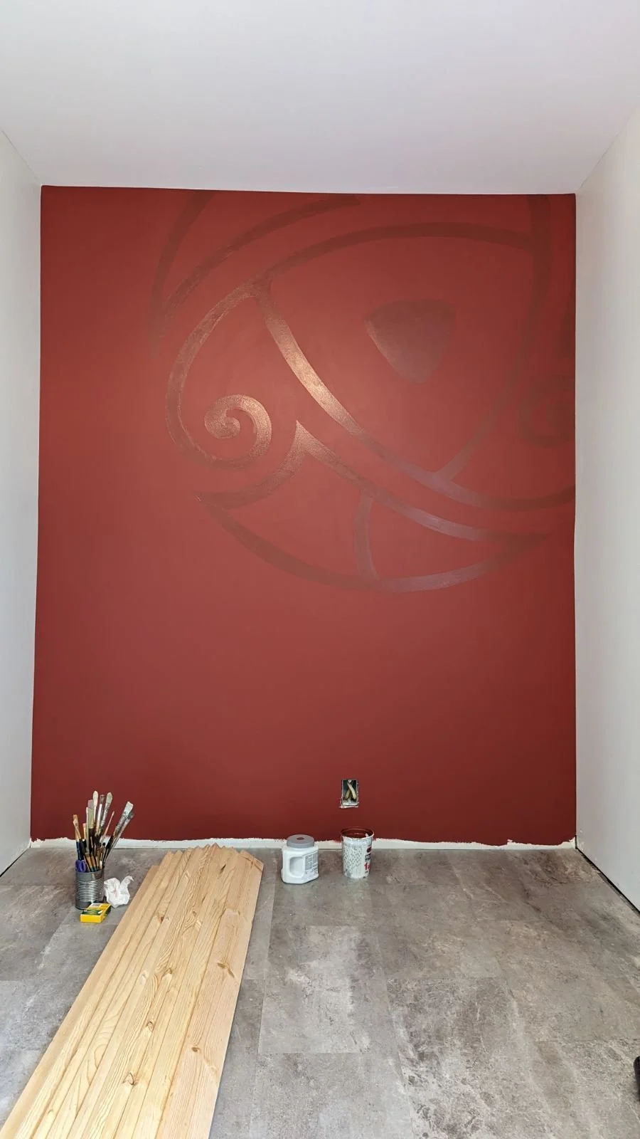 Room with red accent wall