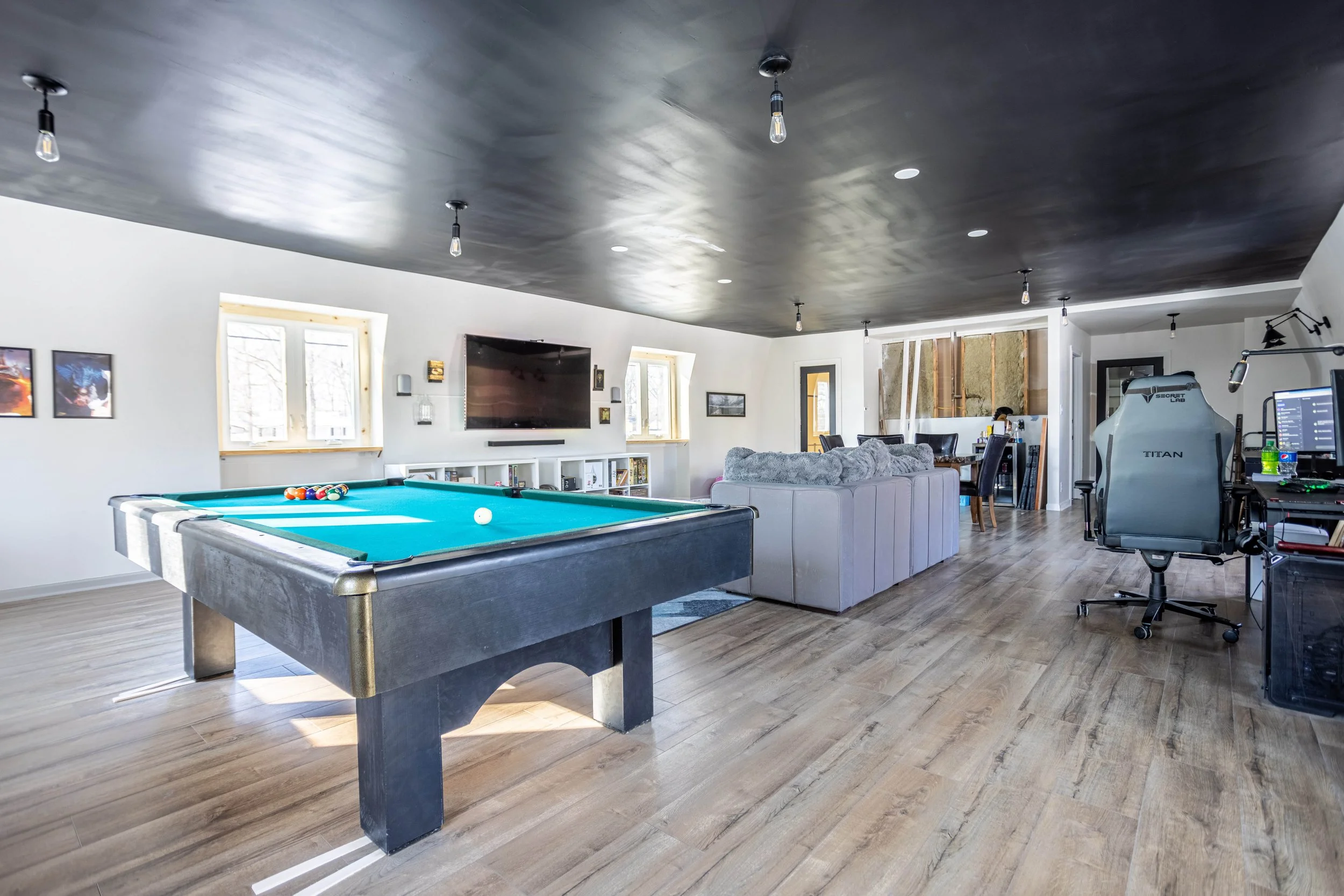 Bonus room with couch tv and pool table