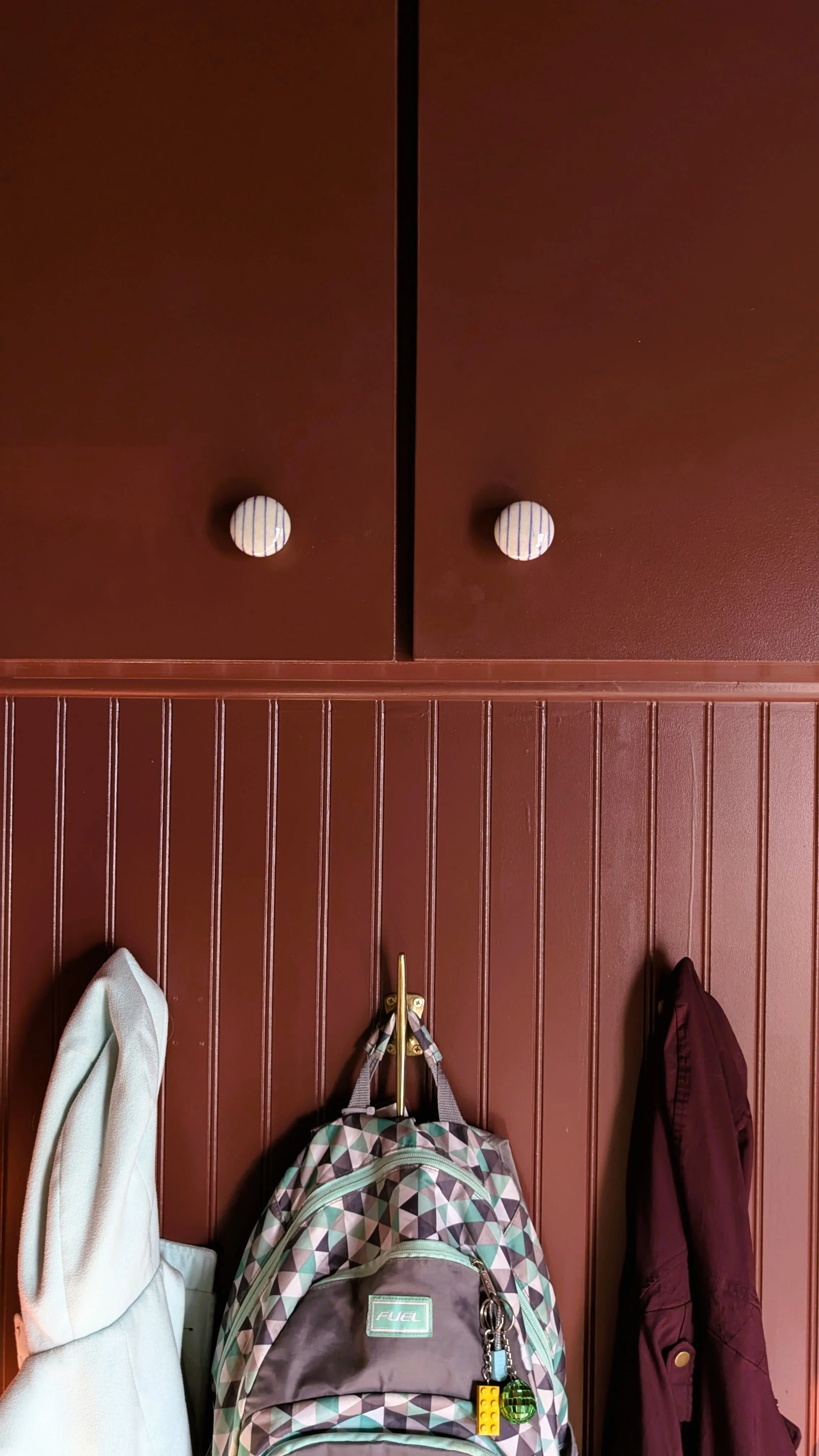 Close-up of striped ceramic cabinet knob