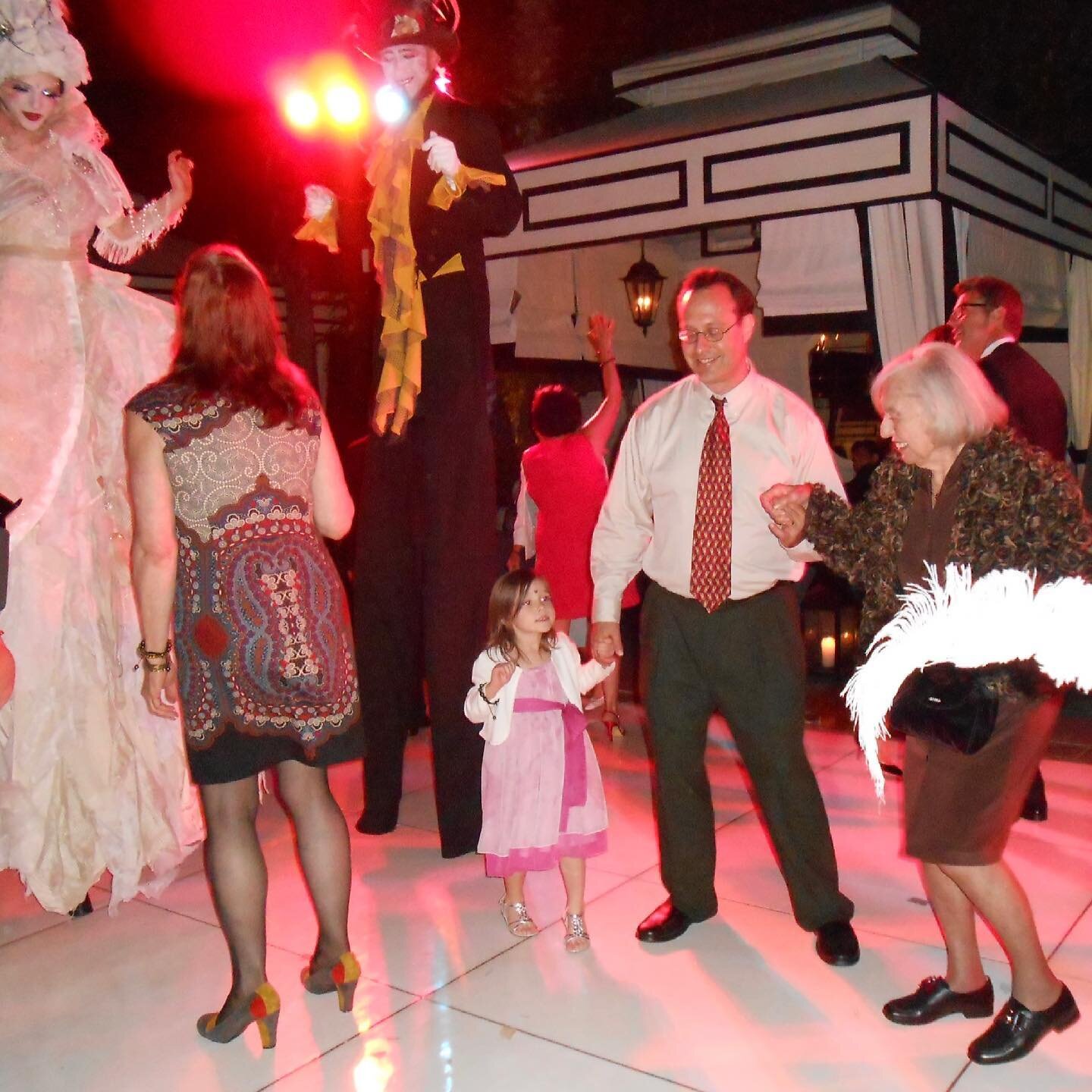 My then tiny niece, my younger brother and my one and only Mom at my wedding 4/28/12
With stilt walkers
of course! Oh to dance with my loved ones again! #memories #dance #family #wedding #hugs