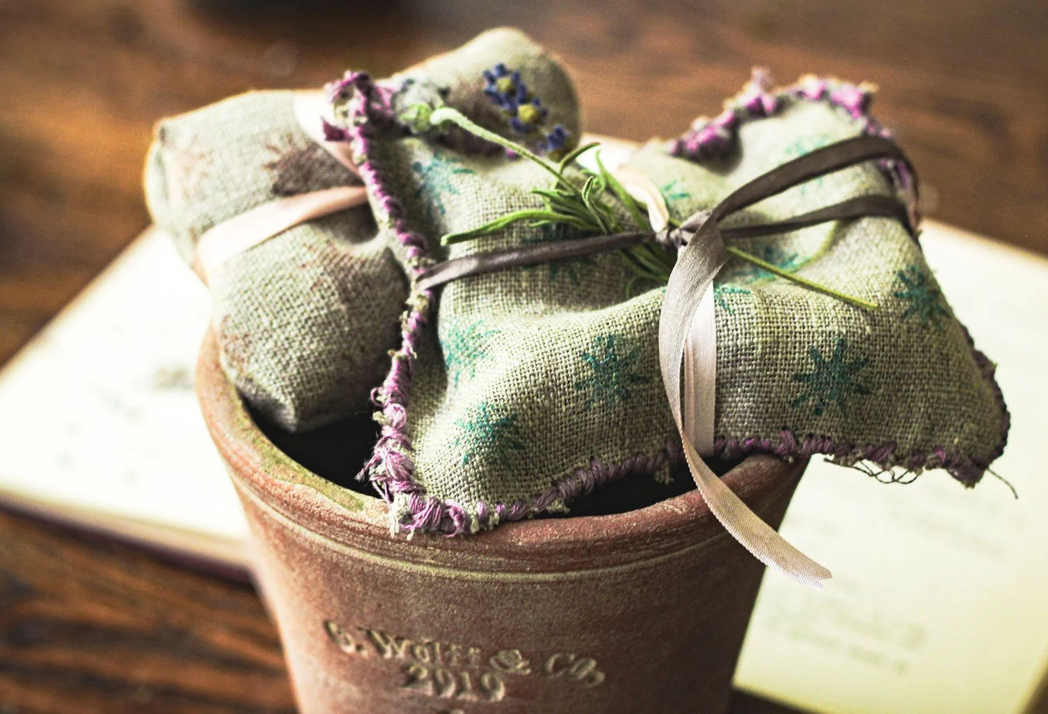 Herbal sachets in flower pot.